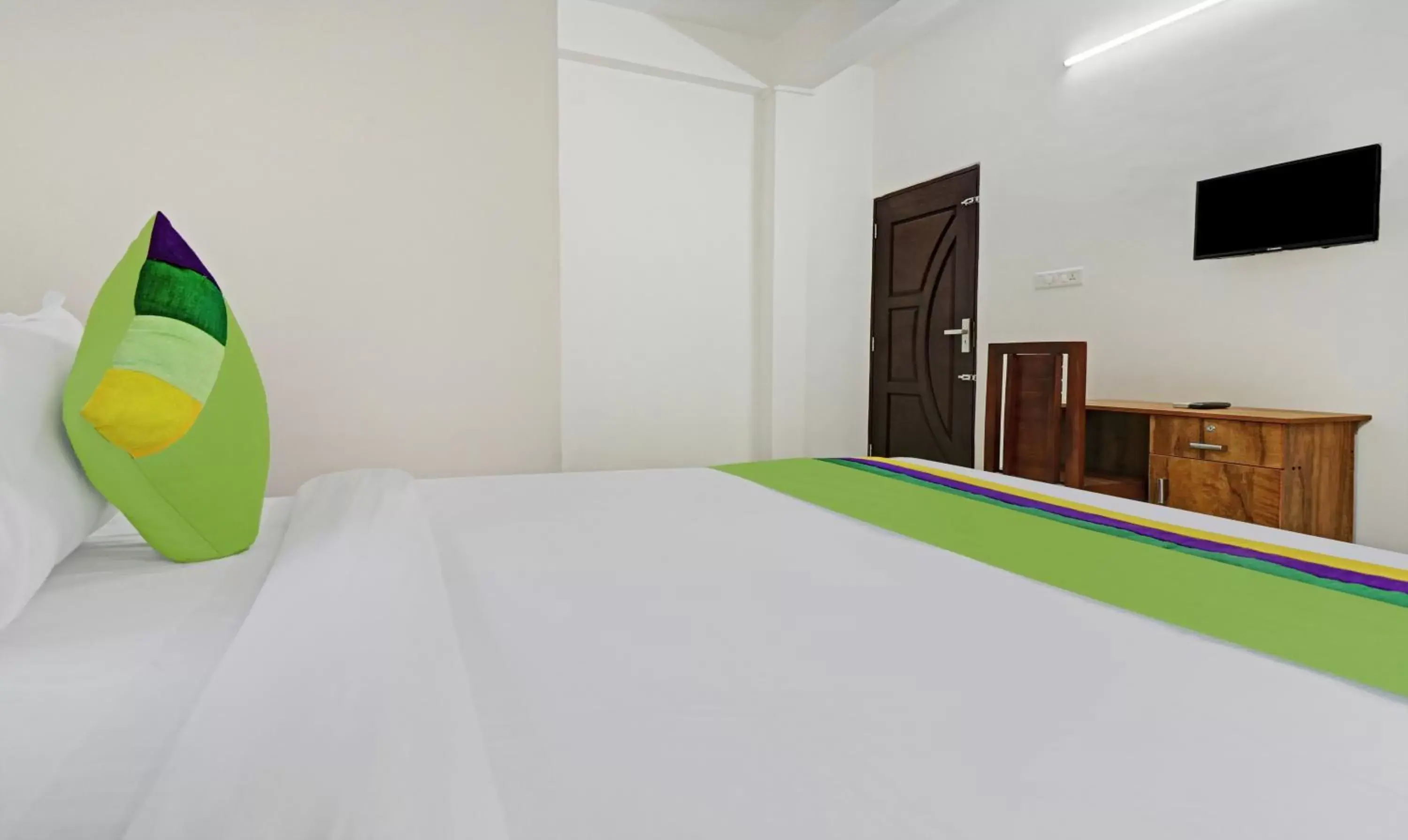 Bed in Treebo Trend Nirupama Apartment