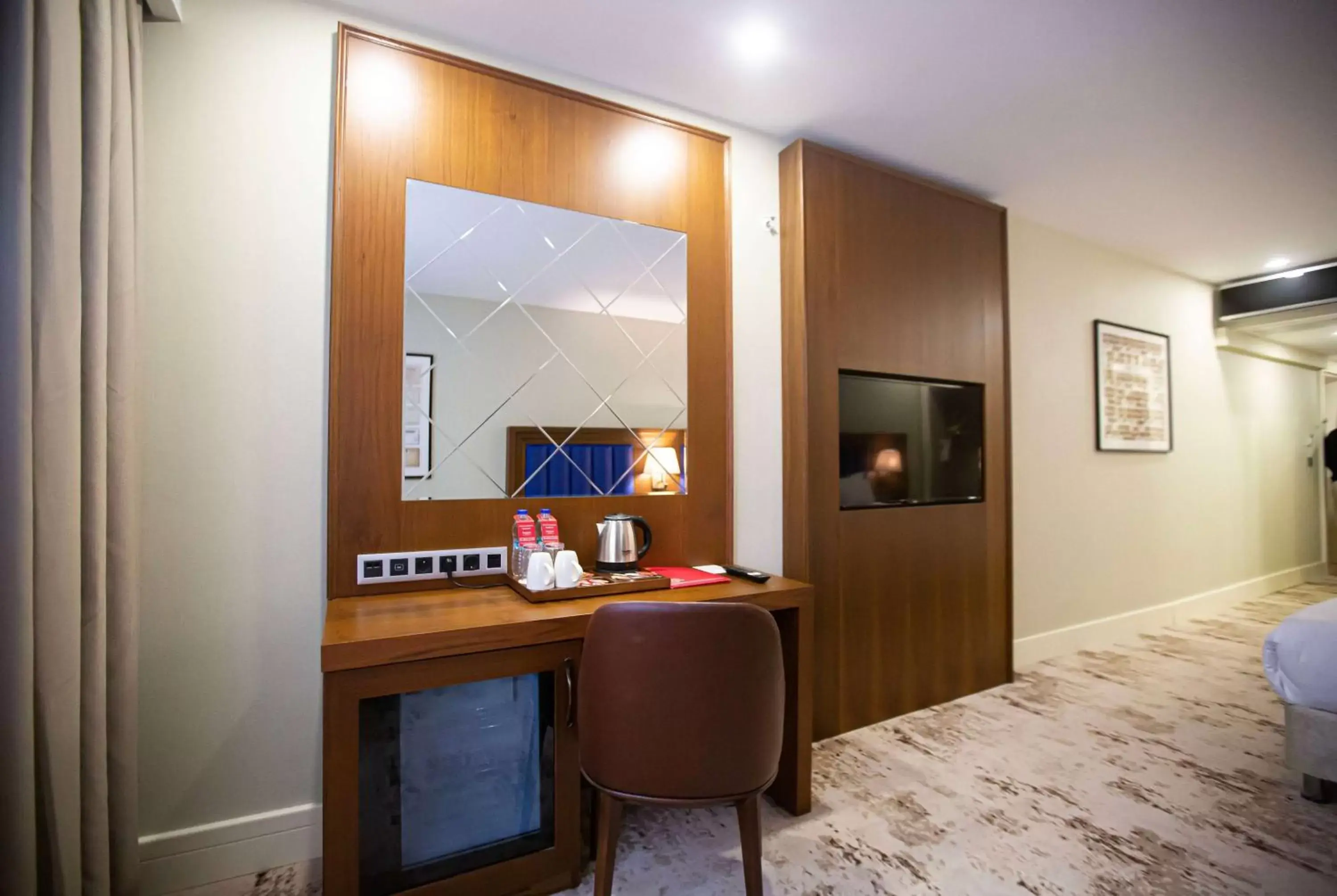 Photo of the whole room, TV/Entertainment Center in Ramada Plaza Sultanahmet