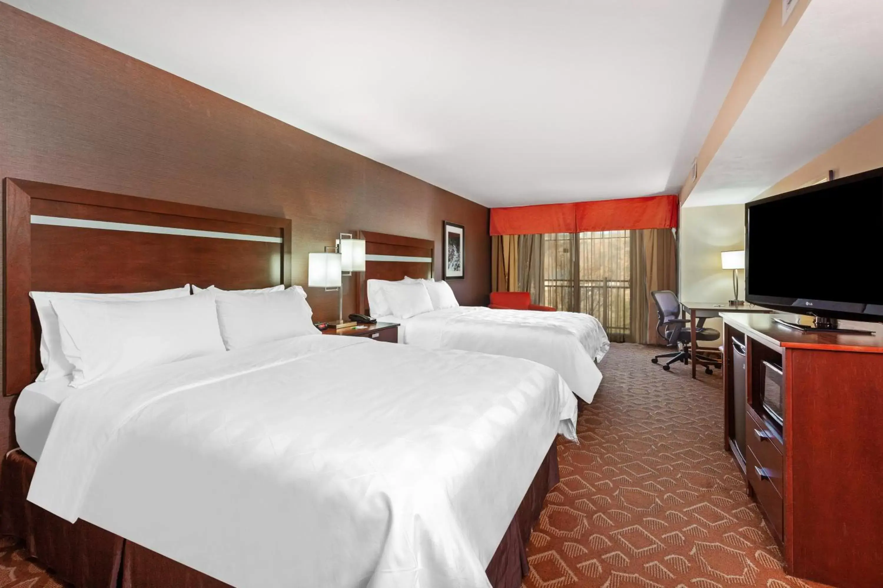 Photo of the whole room, Bed in Holiday Inn & Suites Durango Downtown, an IHG Hotel