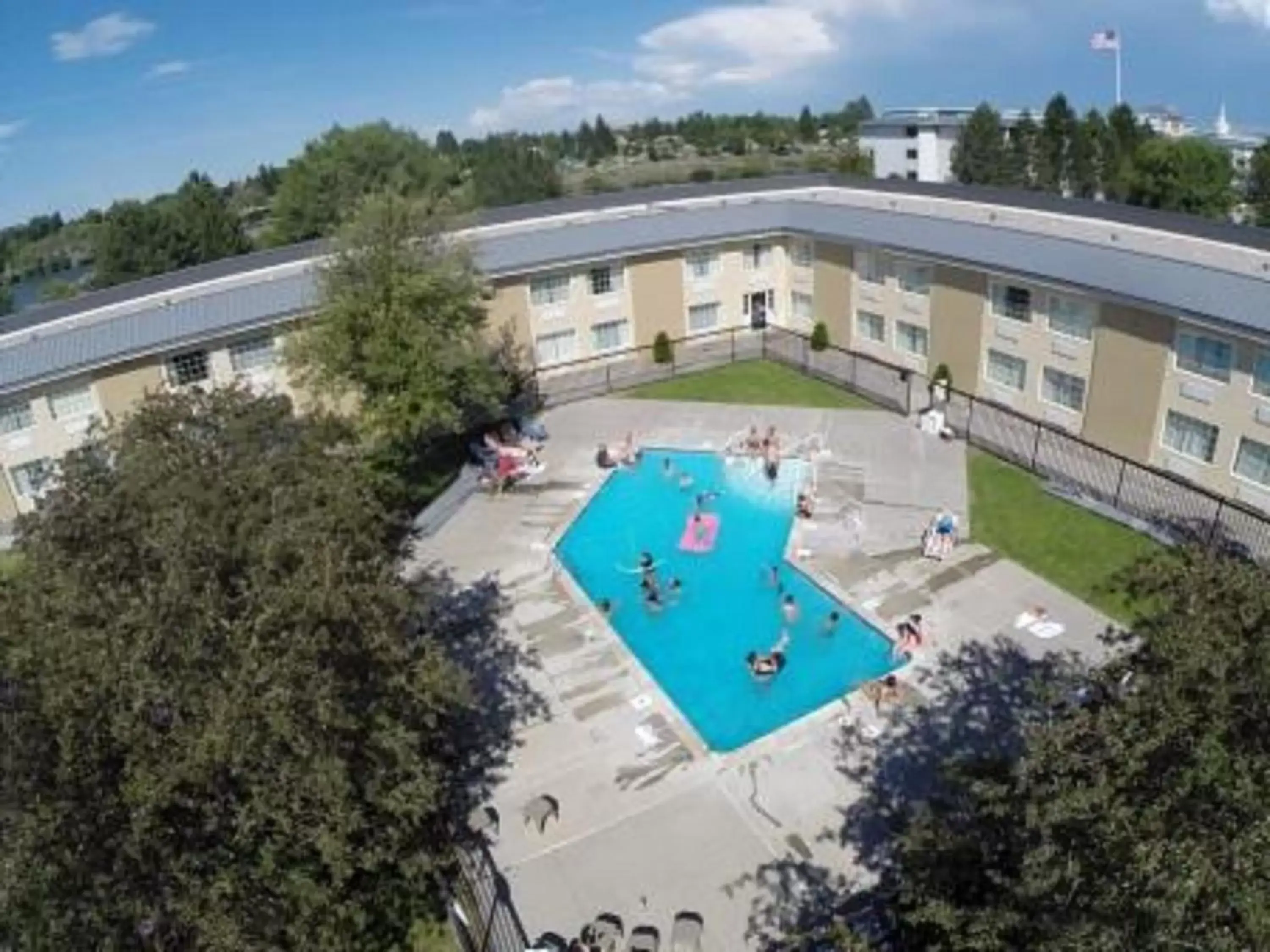 Swimming pool, Pool View in FairBridge Extended Stay, a Kitchenette Hotel