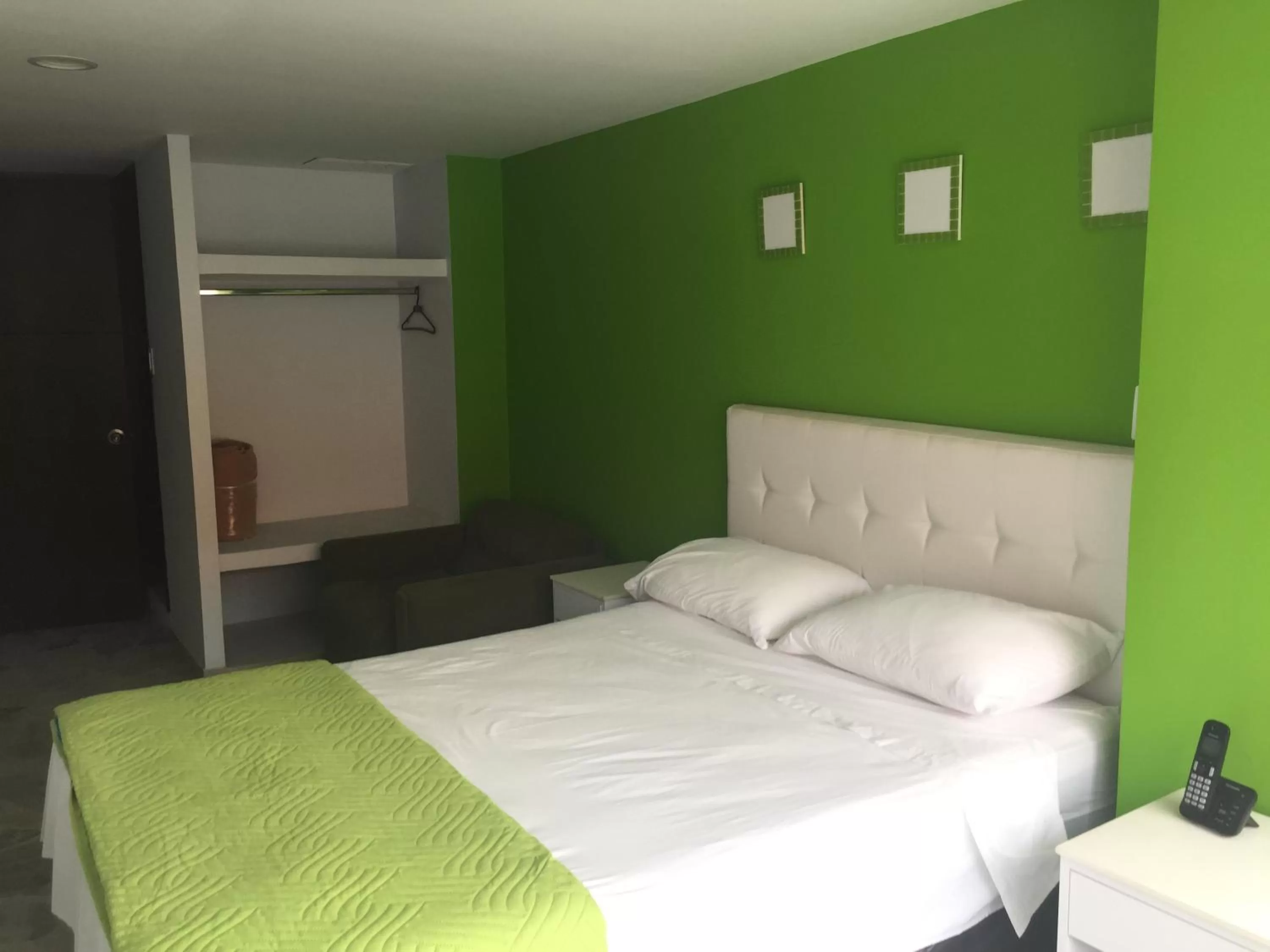 Bed in Hotel Garden City Boutique