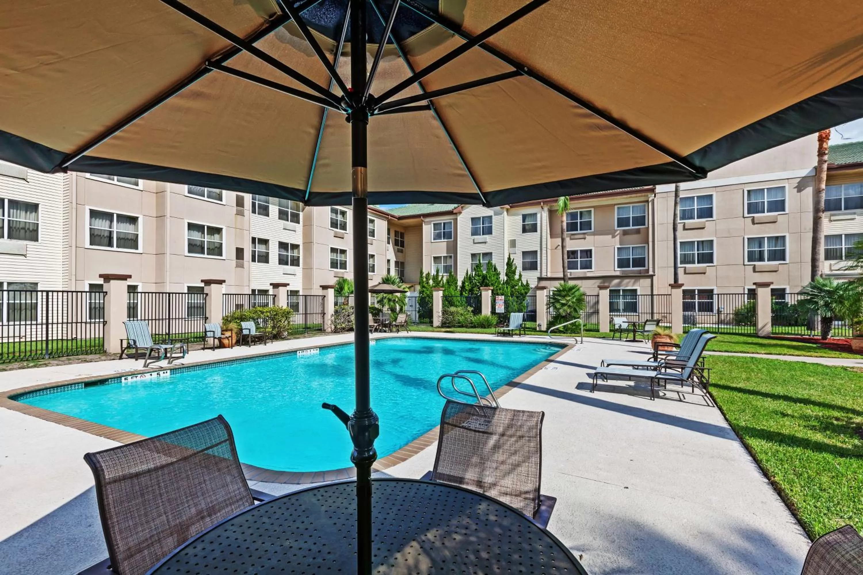 Pool view in Homewood Suites by Hilton Brownsville