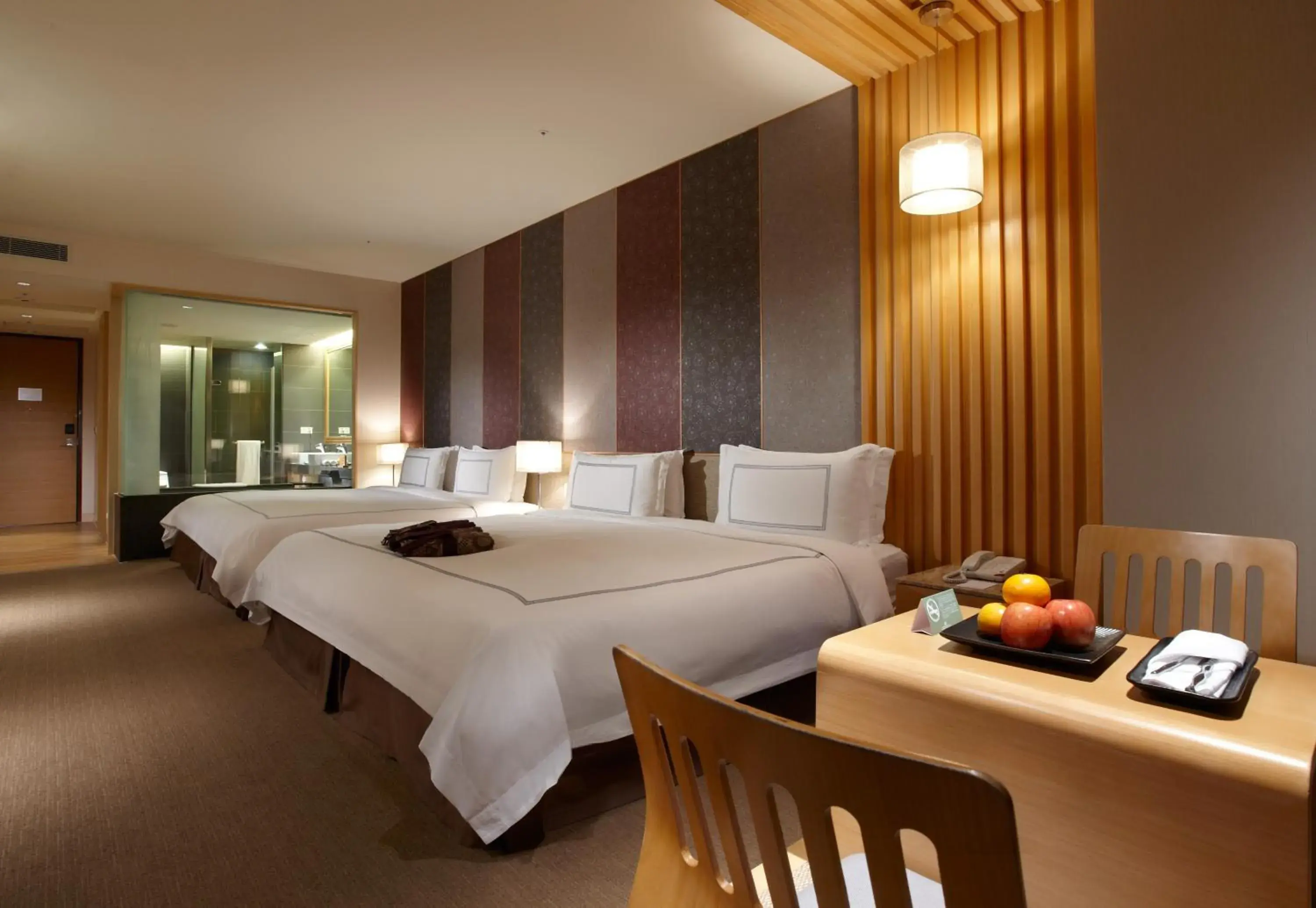 Bed in Evergreen Resort Hotel Jiaosi