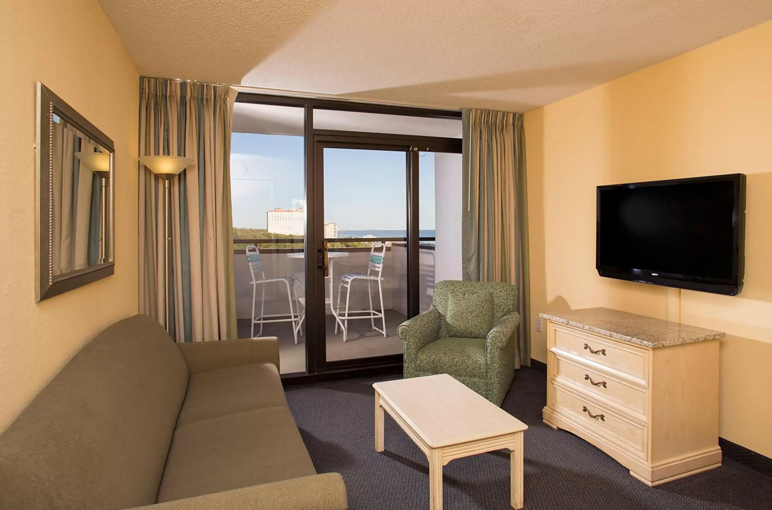 Living room, TV/Entertainment Center in Grande Shores Ocean Resorts Condominiums
