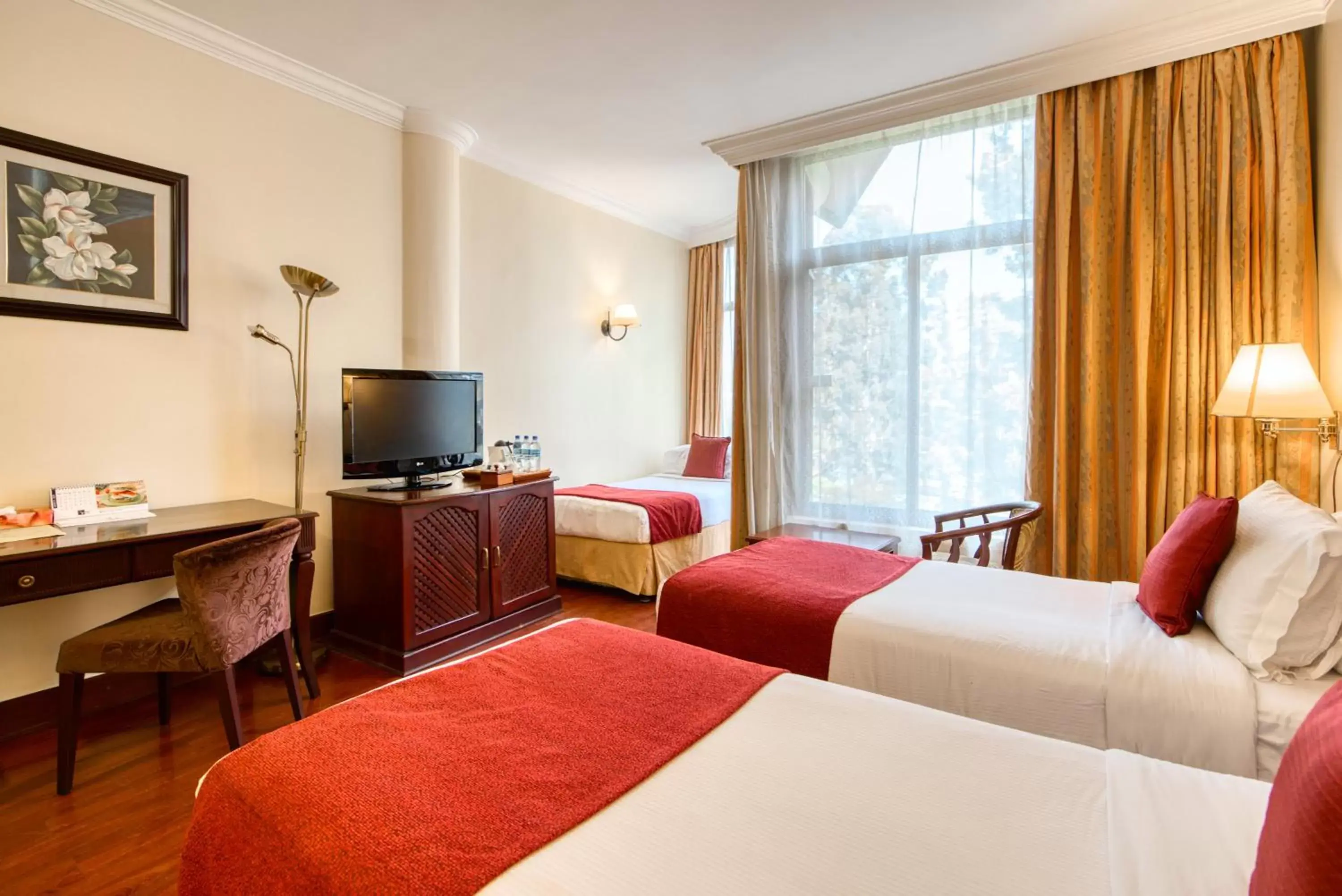 TV and multimedia, Bed in Kibo Palace Hotel Arusha TV and multimedia, Bed in Kibo Palace Hotel Arusha