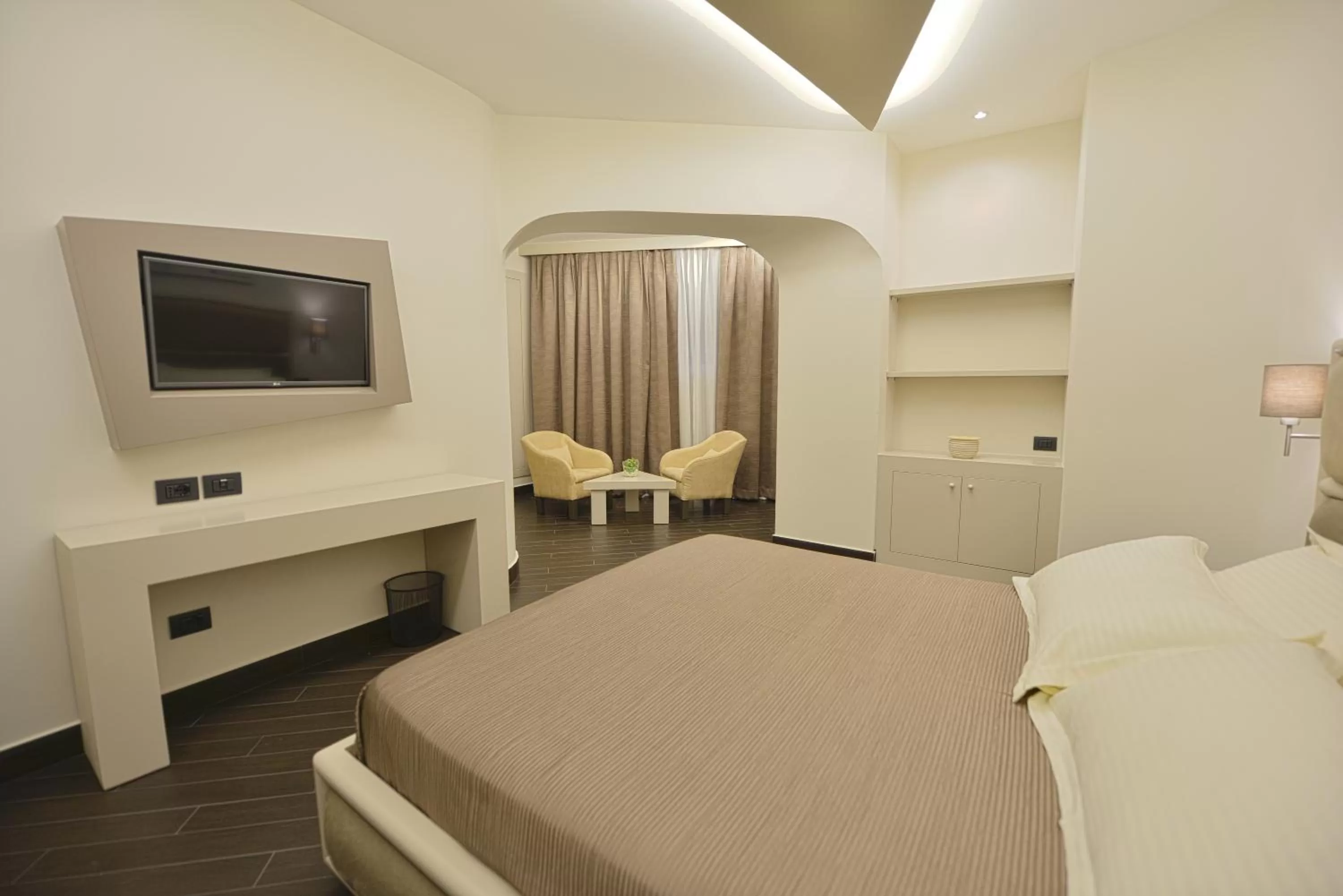 Bed in Petit Hotel Elita