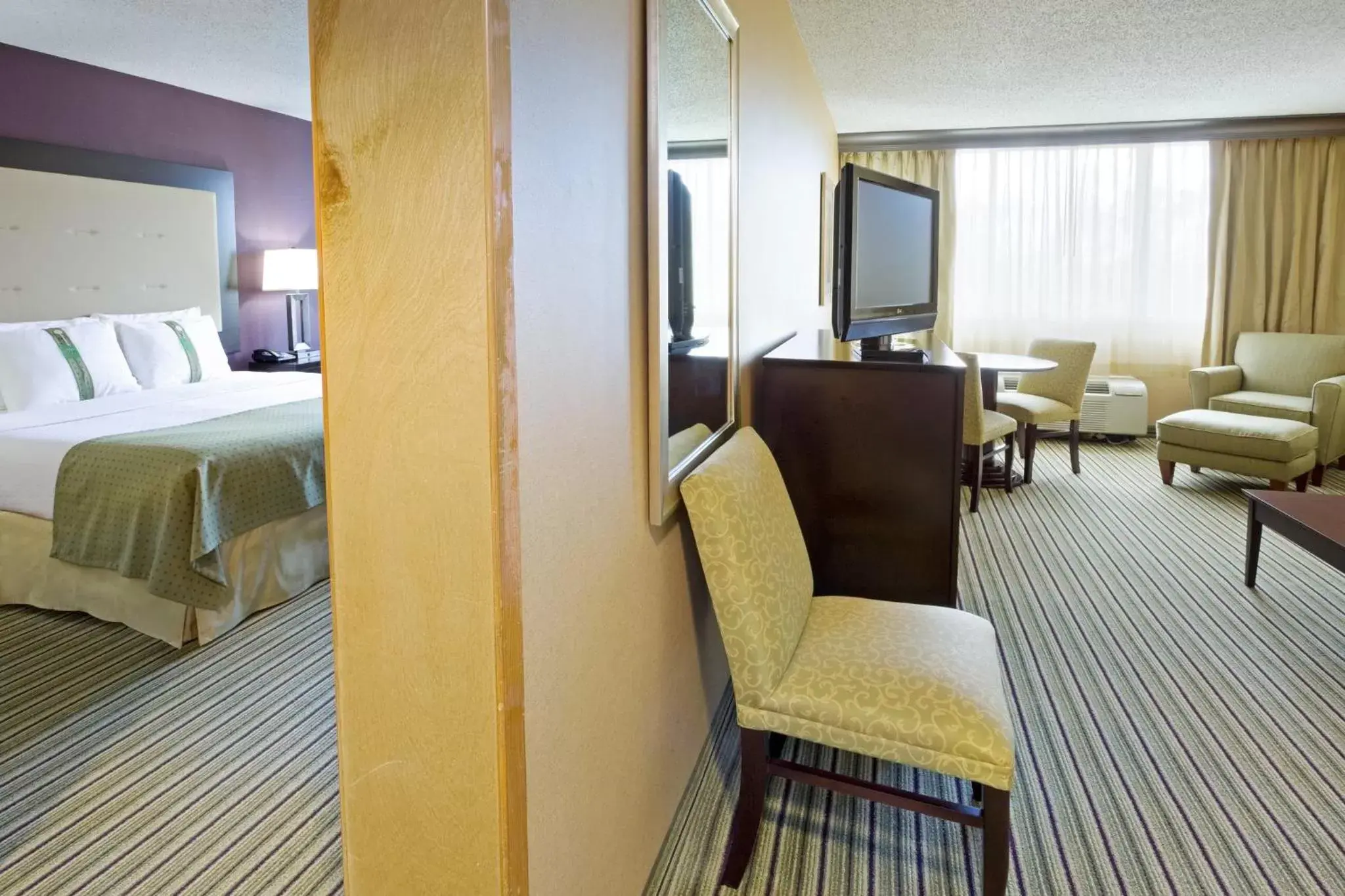 Bedroom in Holiday Inn & Suites Parsippany Fairfield, an IHG Hotel