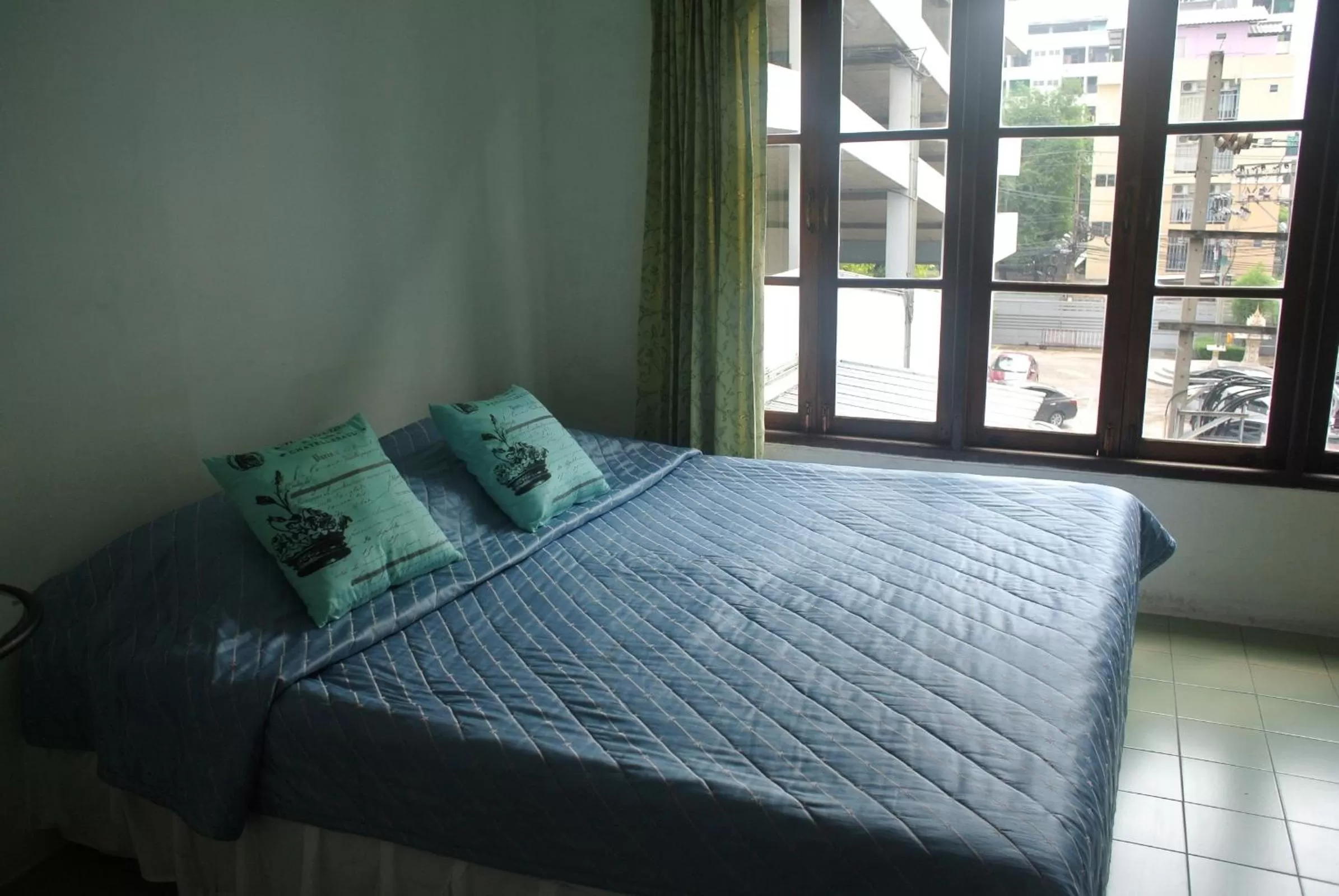 Bed in Oriental Smile Hotel