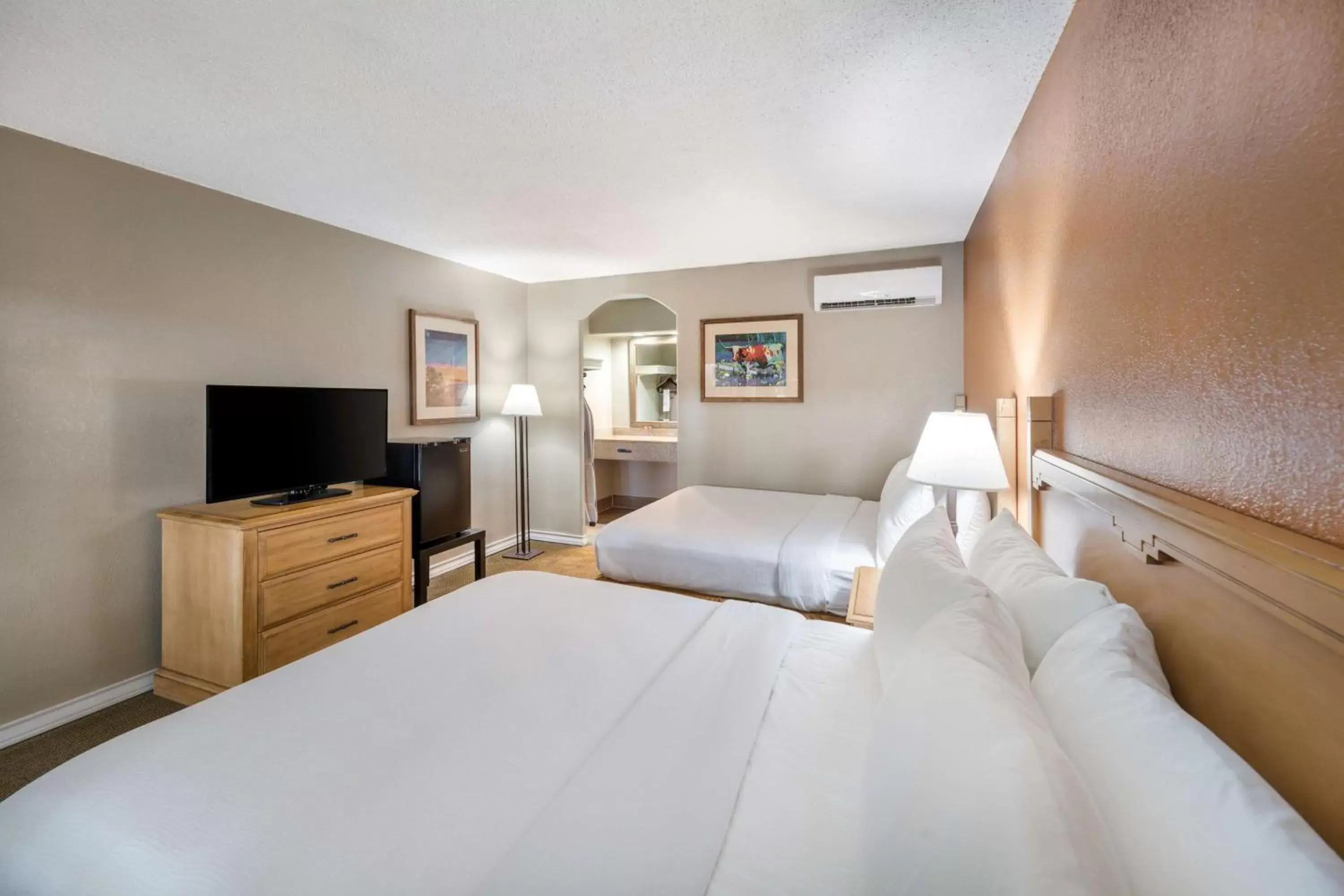 Bedroom, Bed in Pearl on the Concho SureStay Collection by Best Western