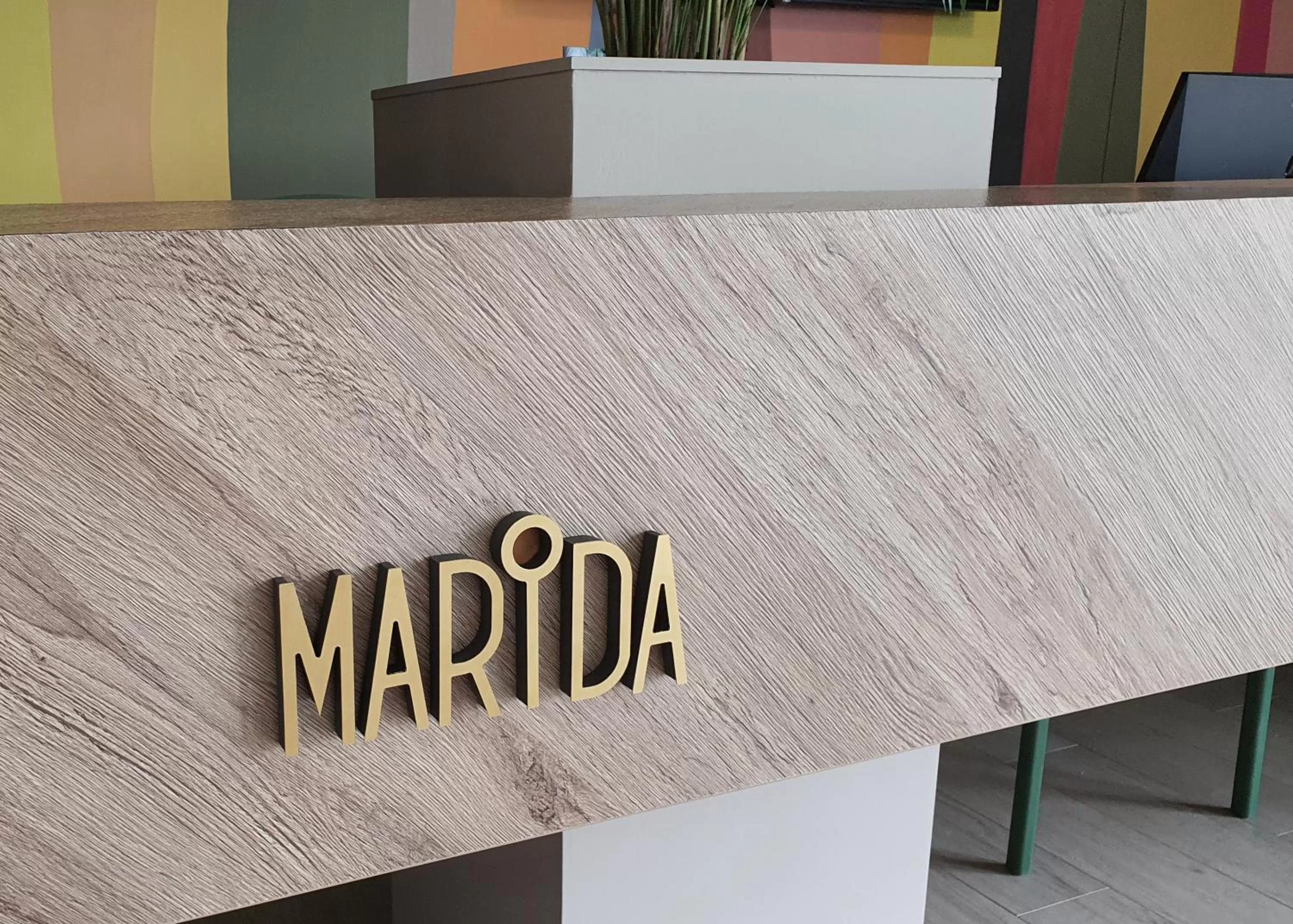 Property logo or sign in Marida Hotel