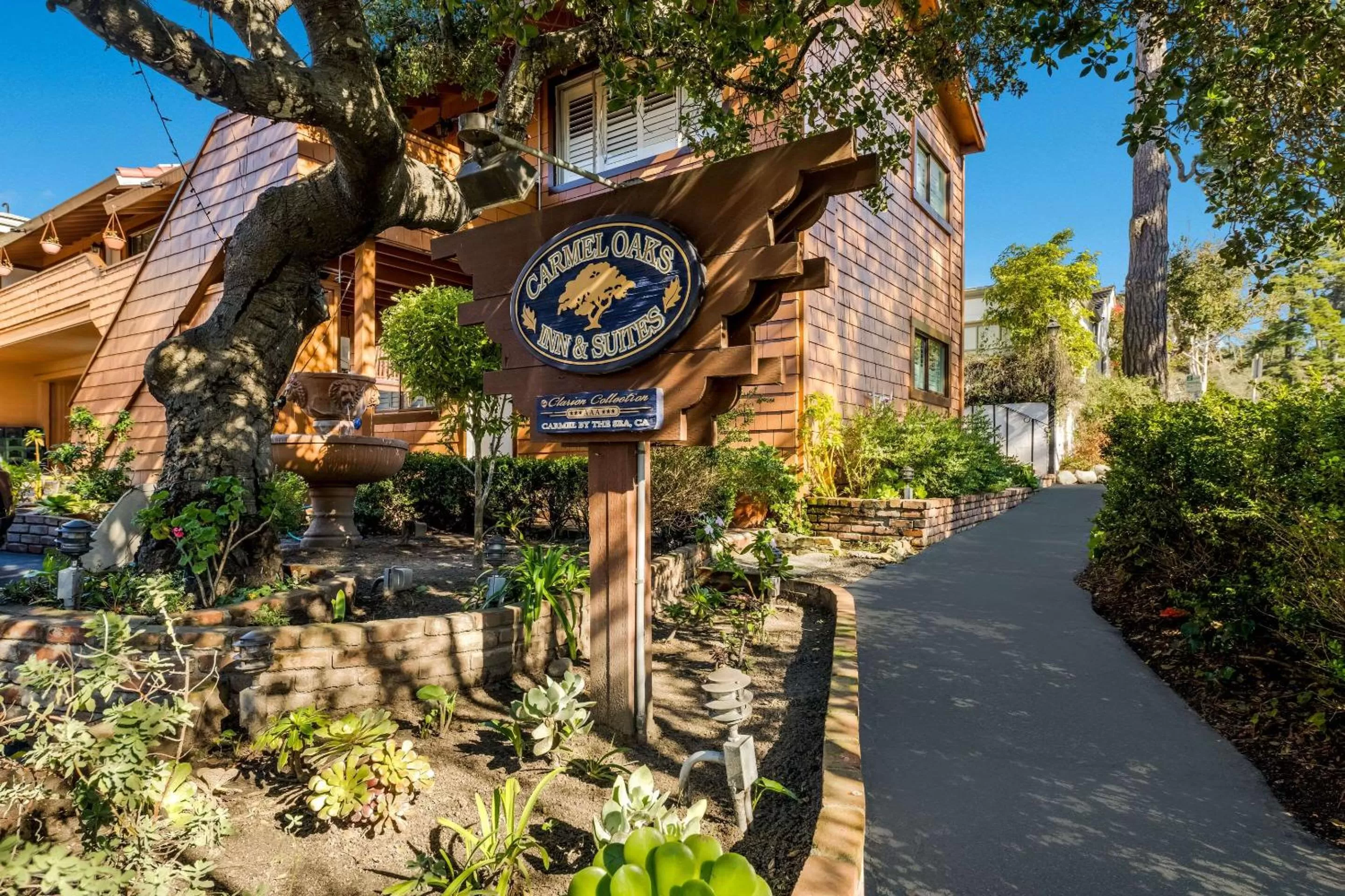 Property building in Clarion Collection Carmel Oaks Inn