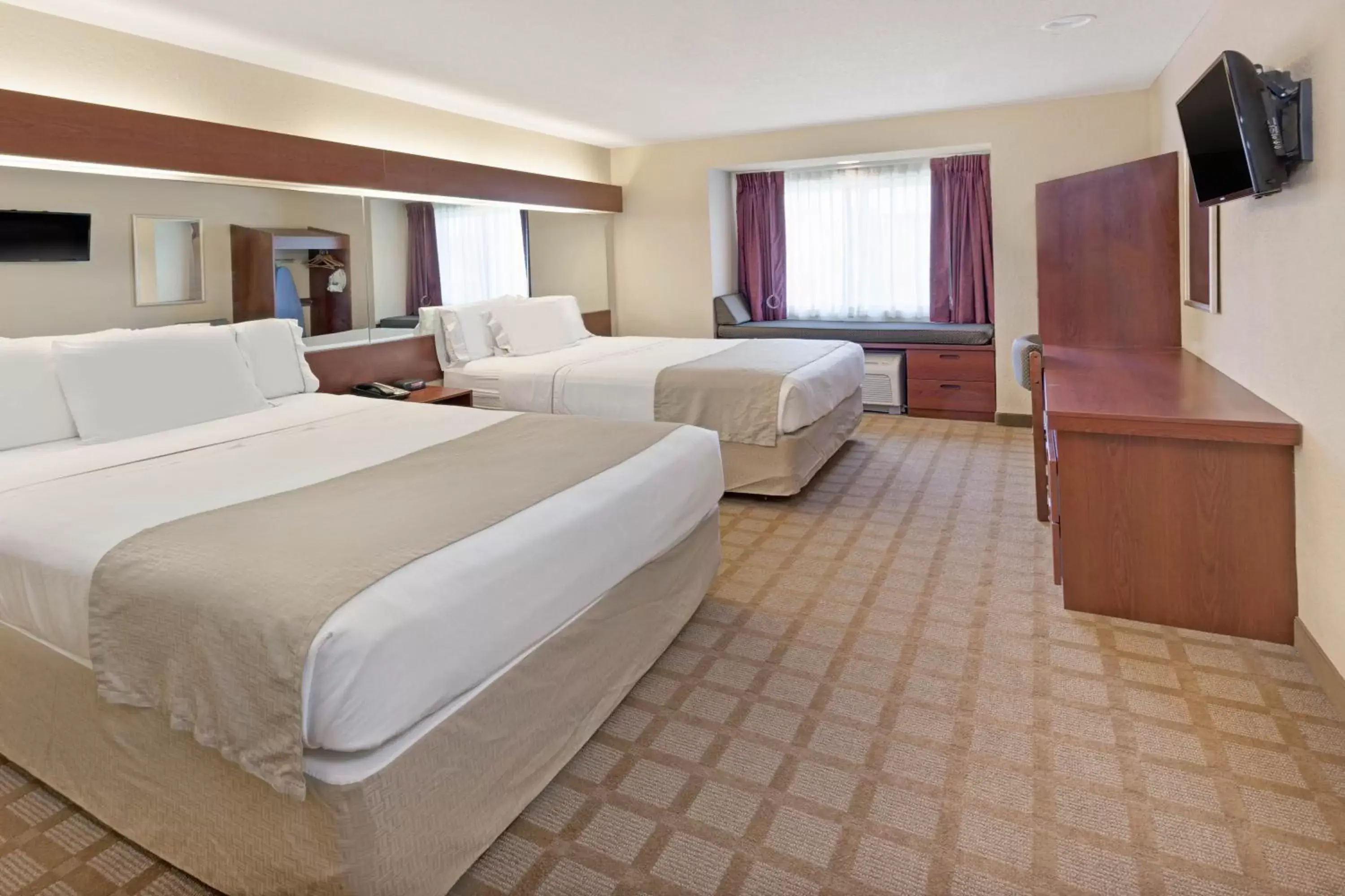 Photo of the whole room, Bed in Microtel Inn & Suites by Wyndham Jasper