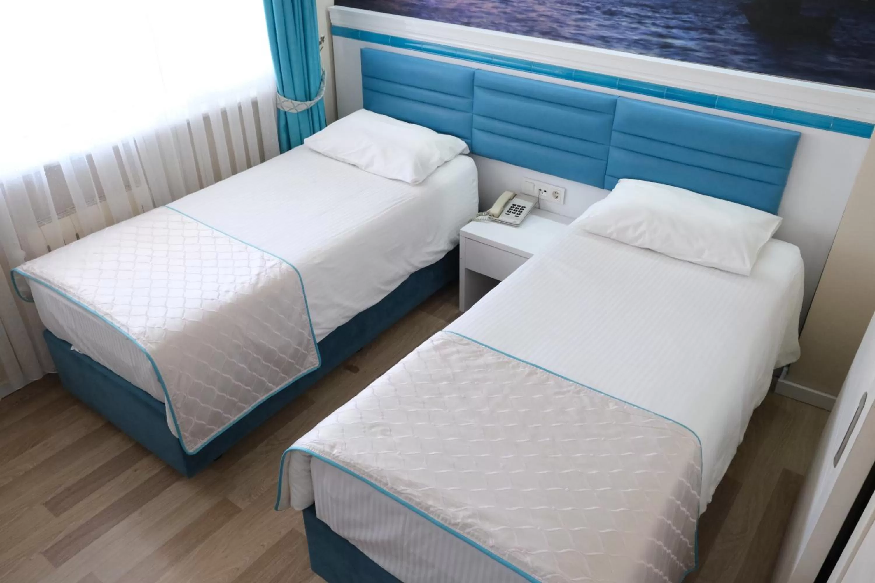 Bed in Star Holiday Hotel