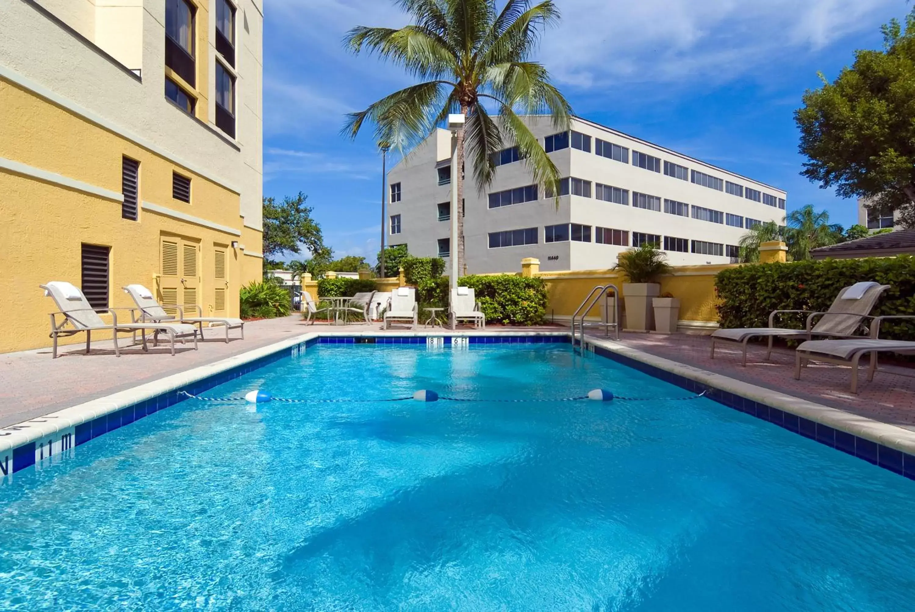Swimming Pool in Holiday Inn Express Hotel & Suites Kendall East-Miami, an IHG Hotel