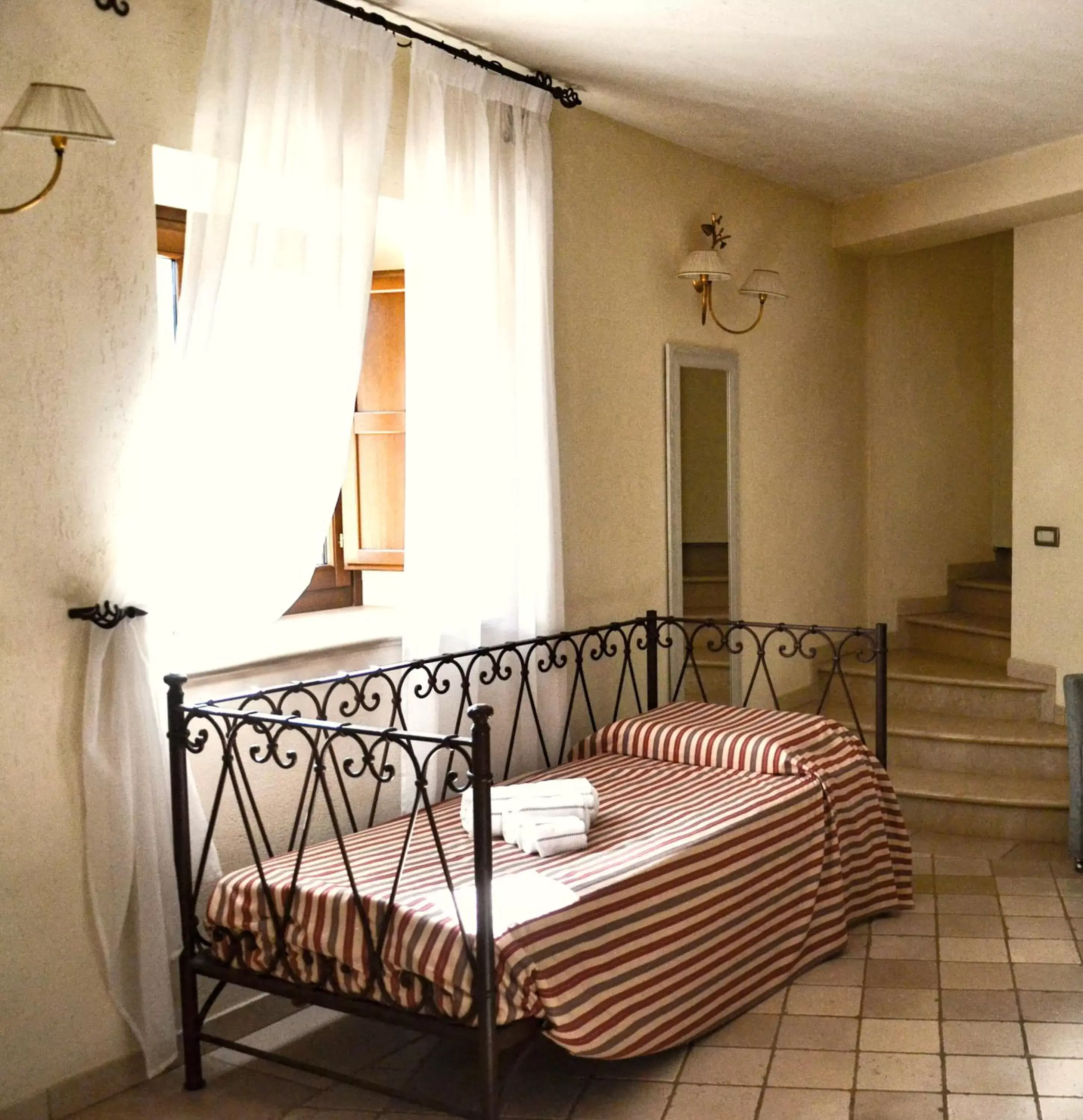 Bed, Seating Area in Relais Sant'Eligio