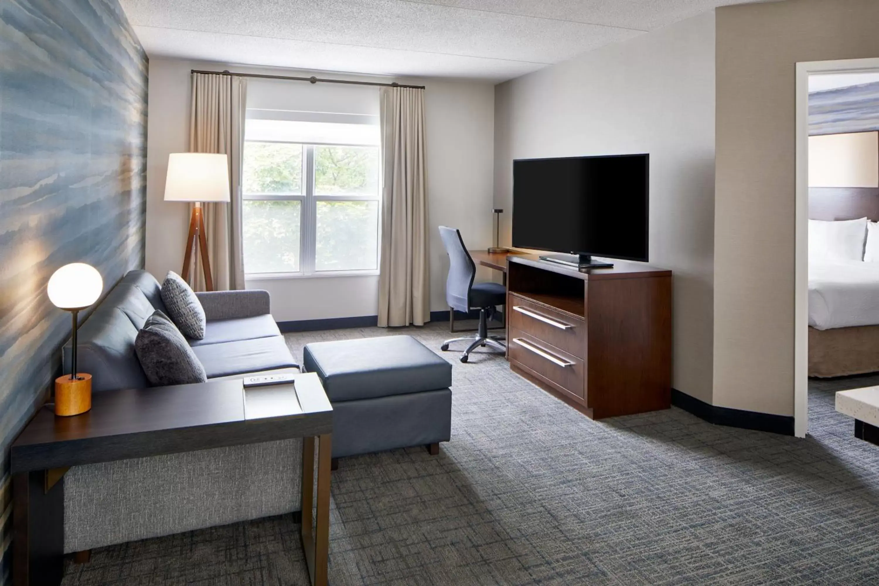 Living room, TV/Entertainment Center in Residence Inn by Marriott Rochester West Greece