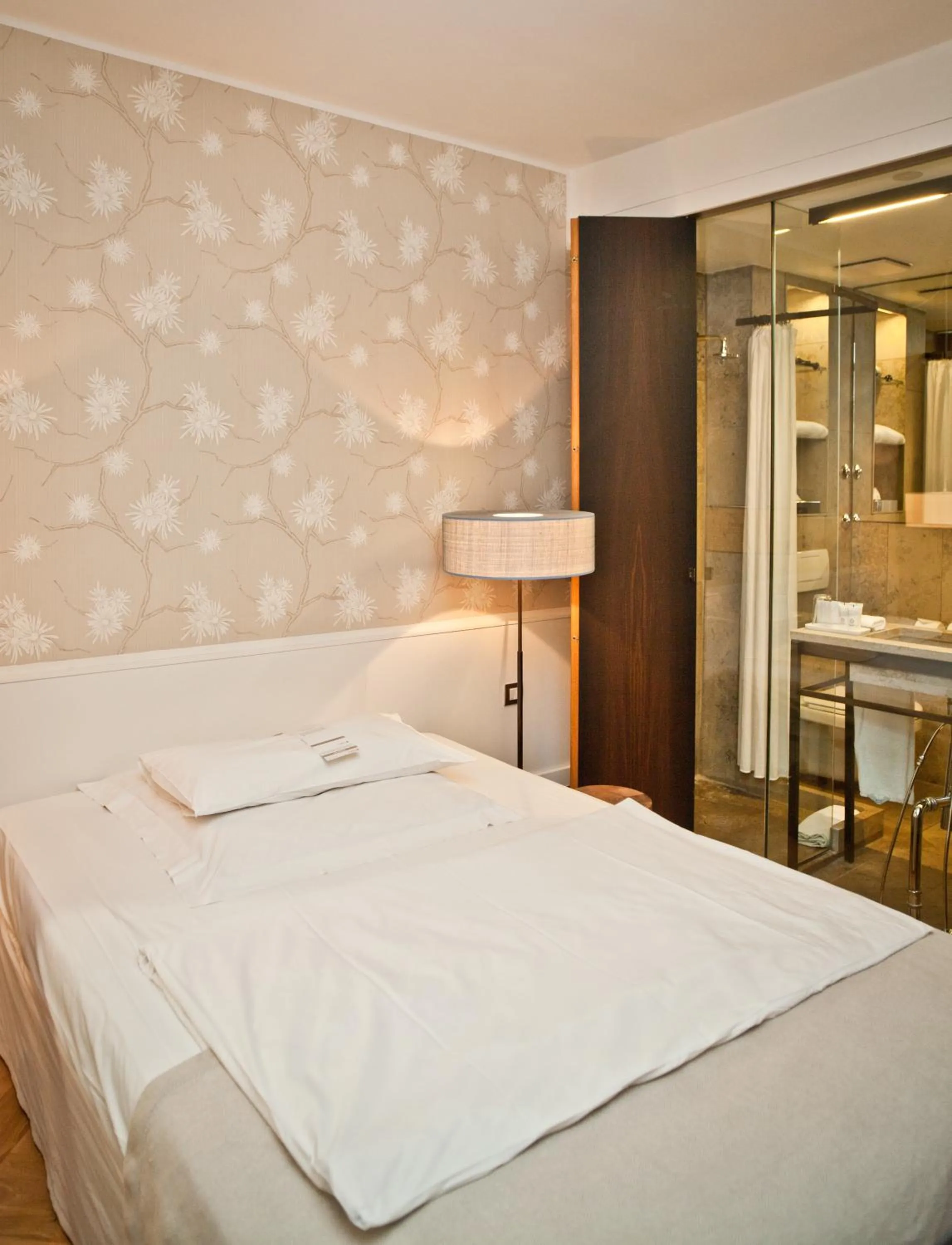 Bed in CORTIINA Hotel