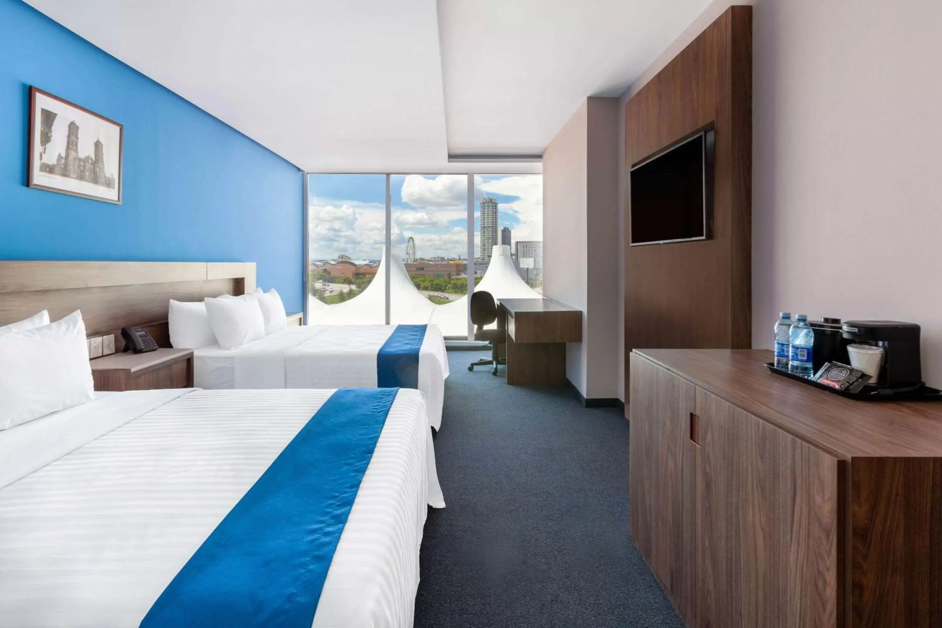 Photo of the whole room, Bed in Wyndham Puebla Angelopolis Photo of the whole room, Bed in Wyndham Puebla Angelopolis