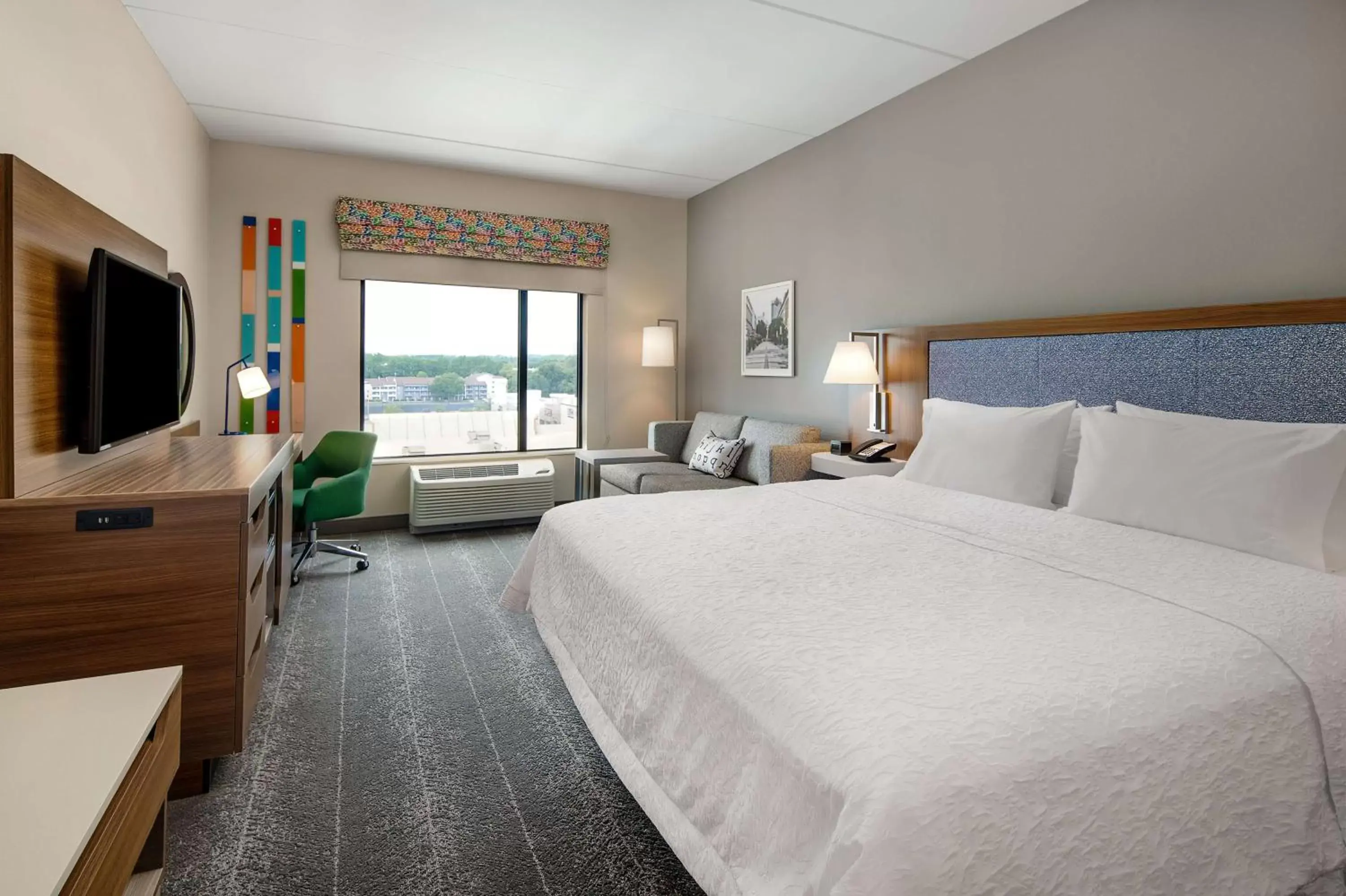 Bedroom in Hampton Inn & Suites Raleigh Midtown, NC