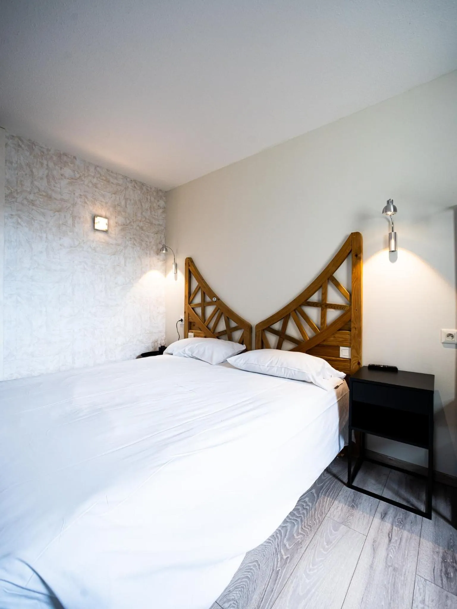 Bed in Hotel Grand Cap Rooftop Pool