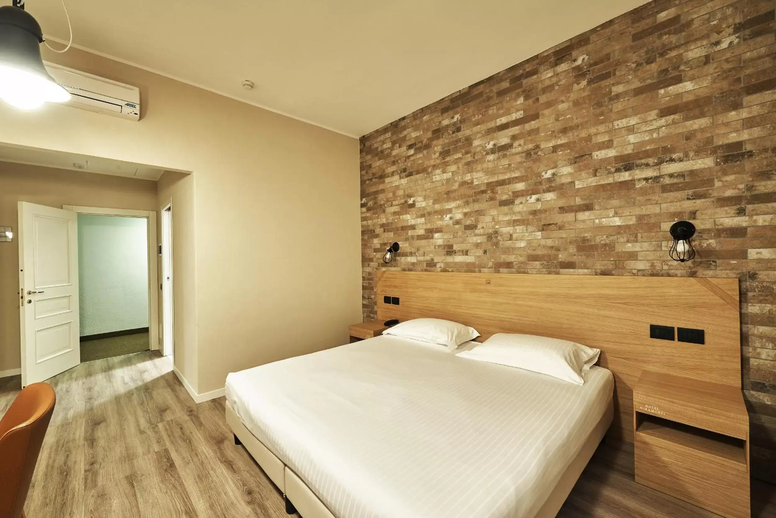 Bed in Hotel Miramonti