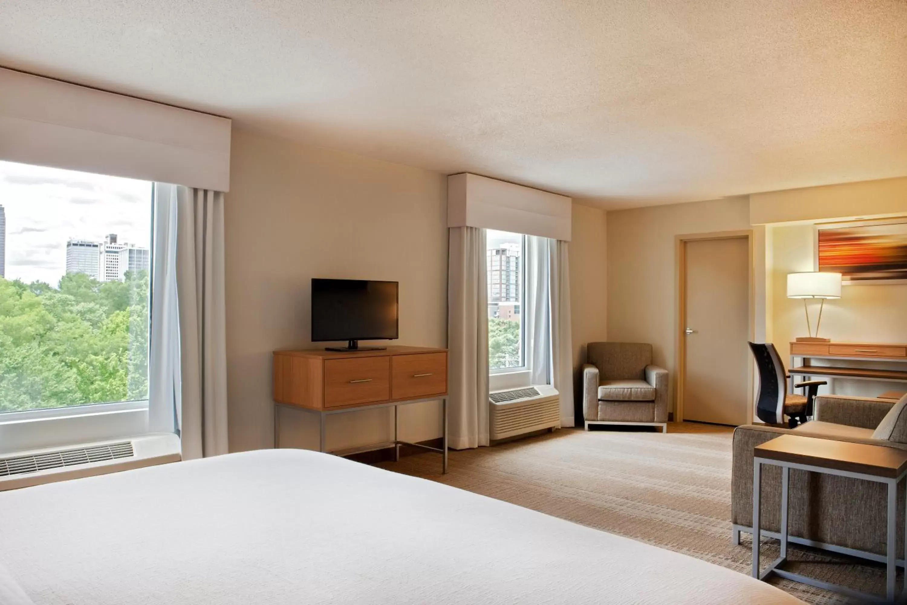 Photo of the whole room, TV/Entertainment Center in Holiday Inn Little Rock - Presidential Downtown, an IHG Hotel