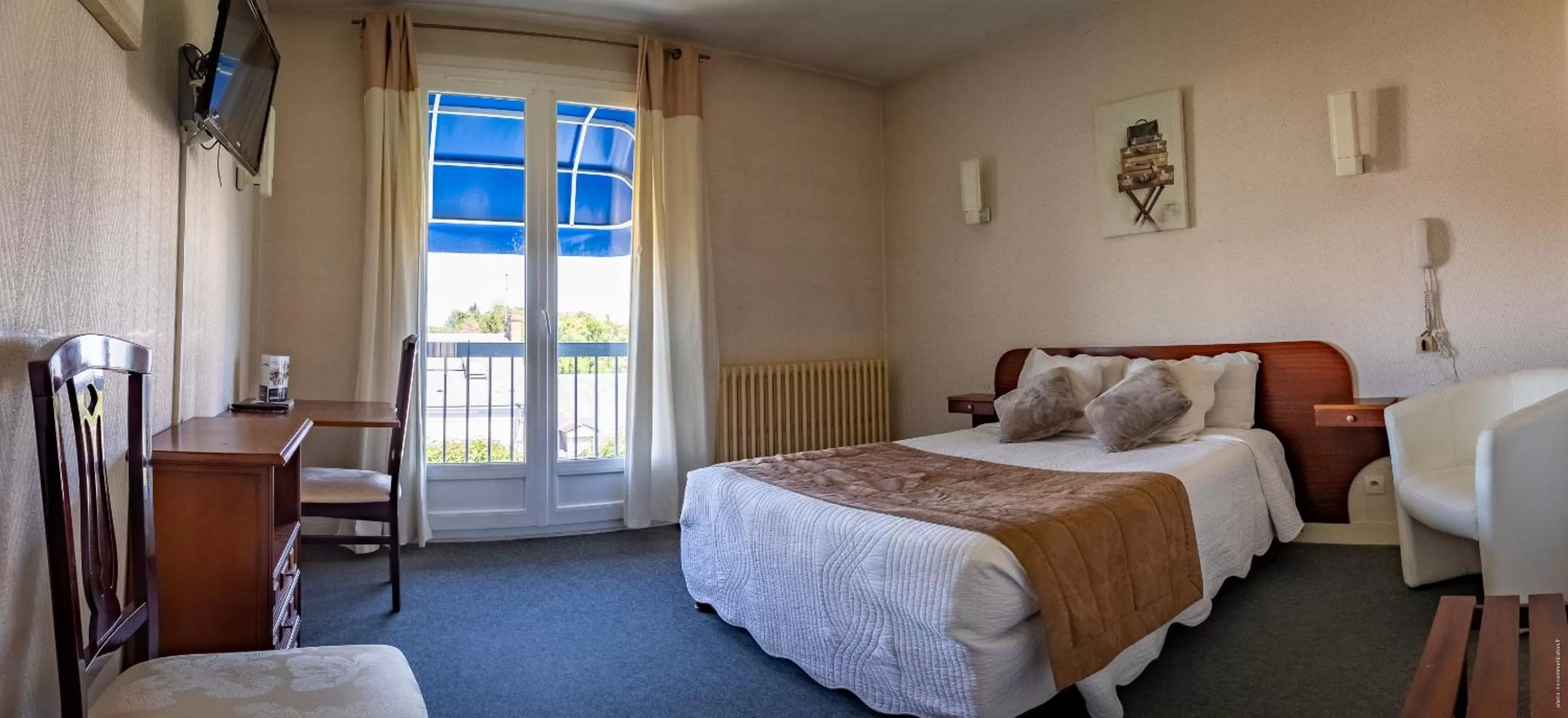 Bed in Hotel Christina