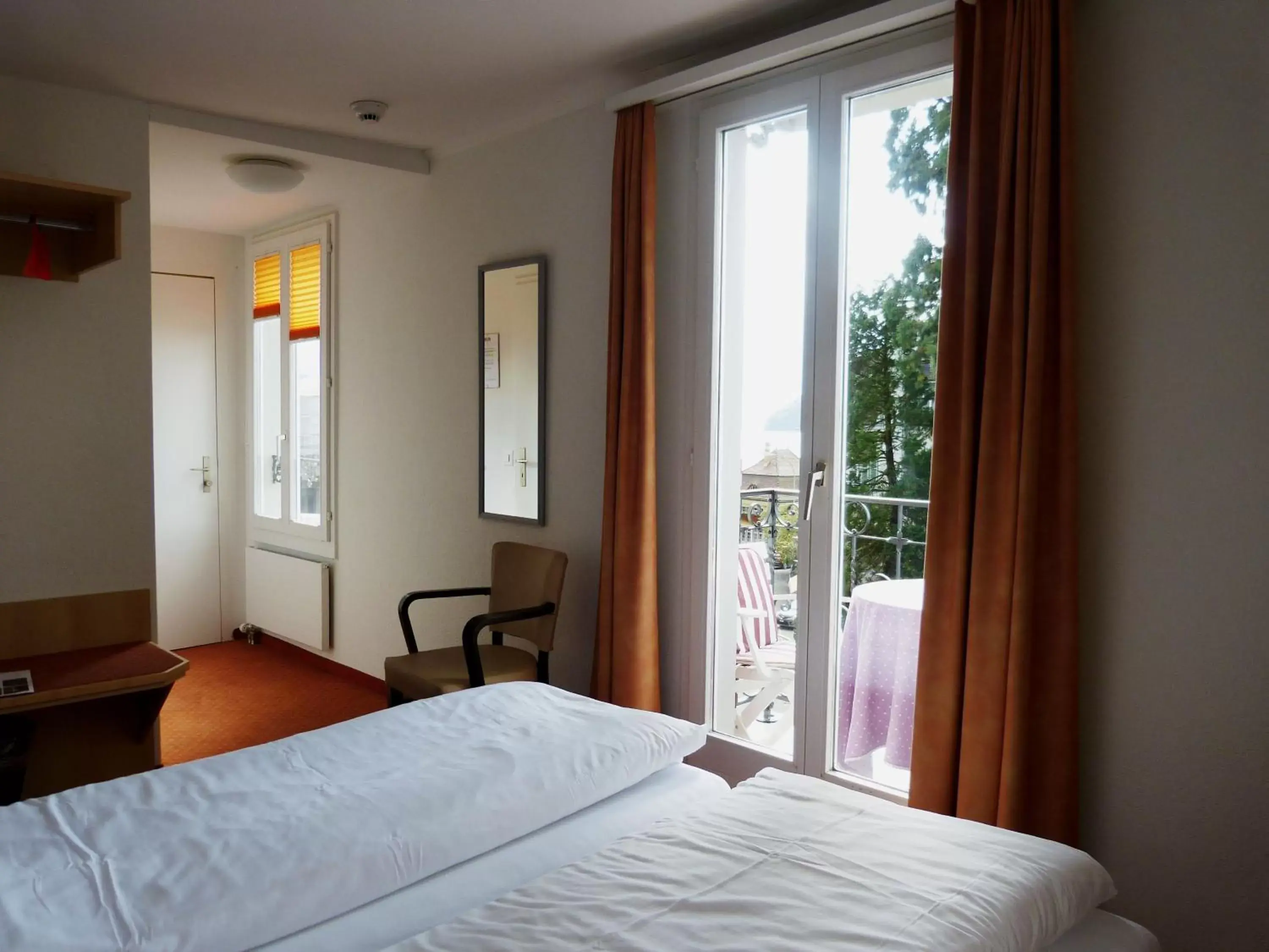 Photo of the whole room, Bed in Hotel Rigi Vitznau
