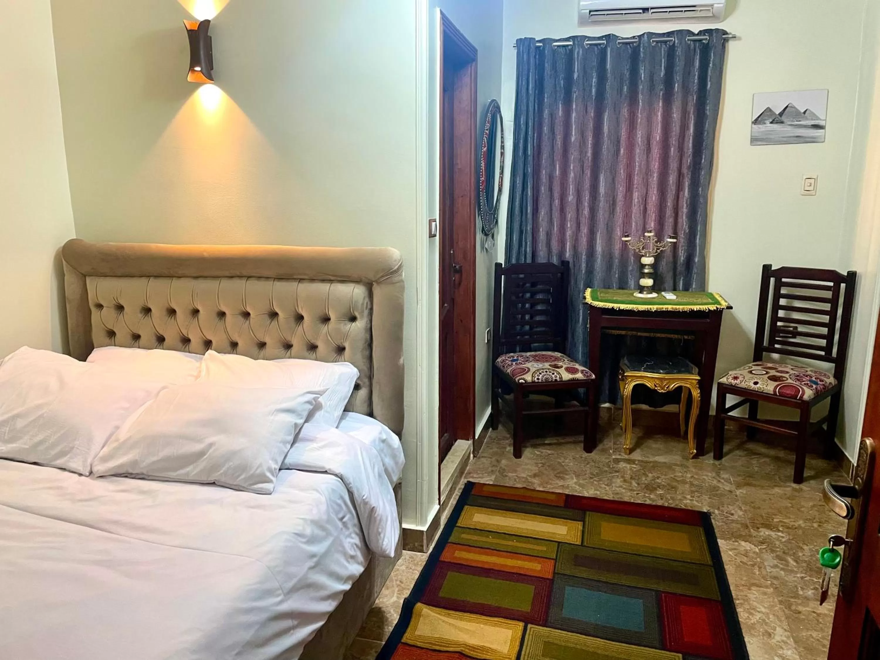 Sphinx palace pyramids view