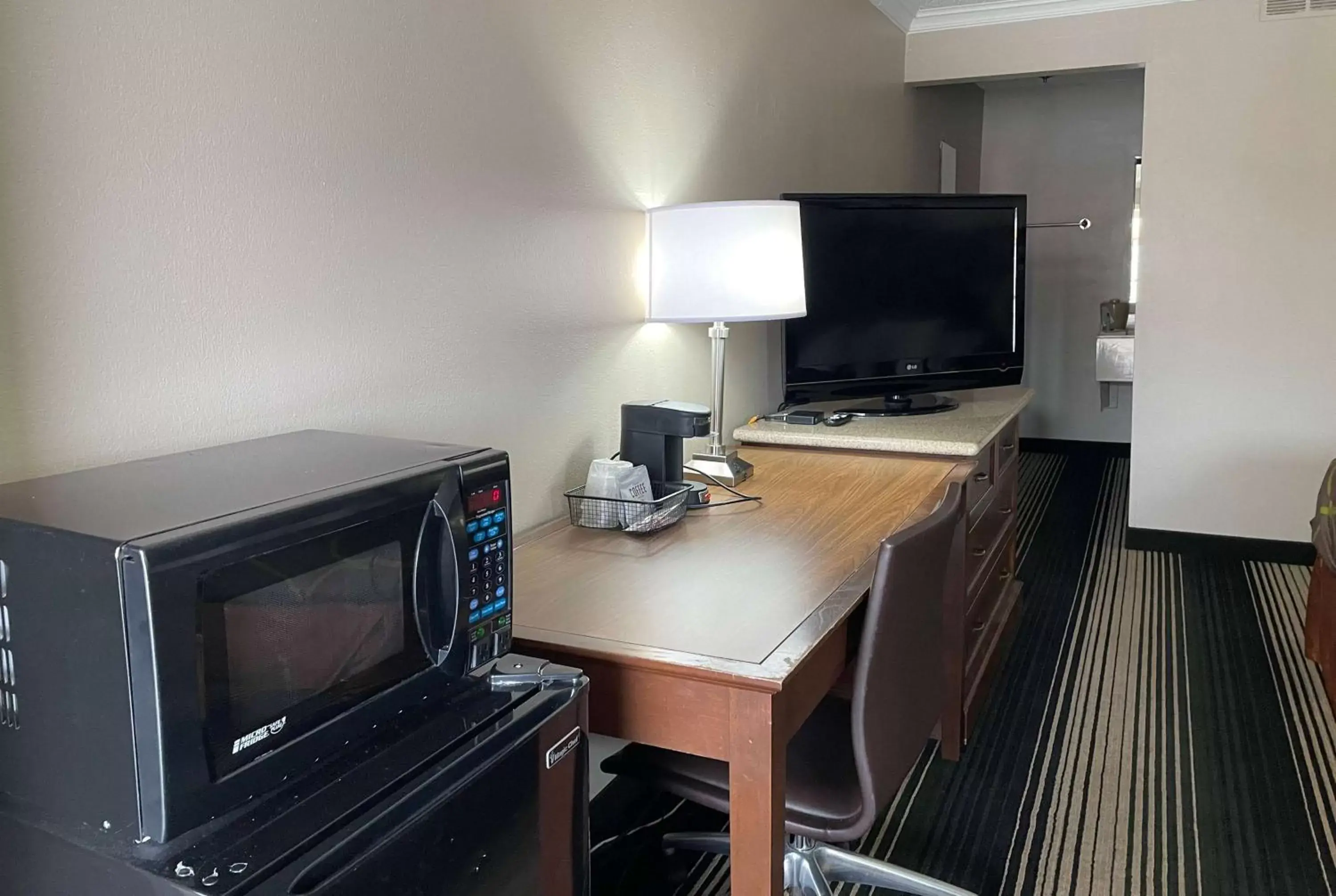 Photo of the whole room, TV/Entertainment Center in Super 8 by Wyndham Junction City