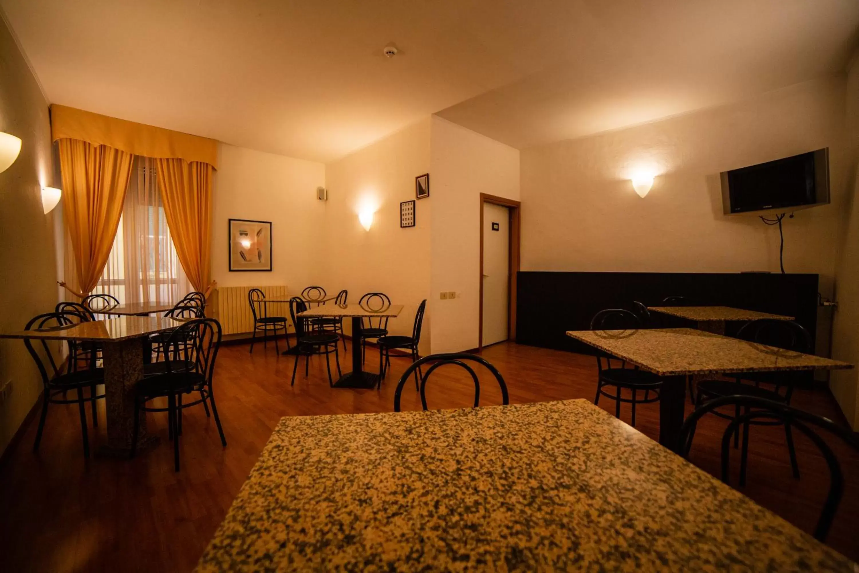 Dining area in Hotel Arcadia