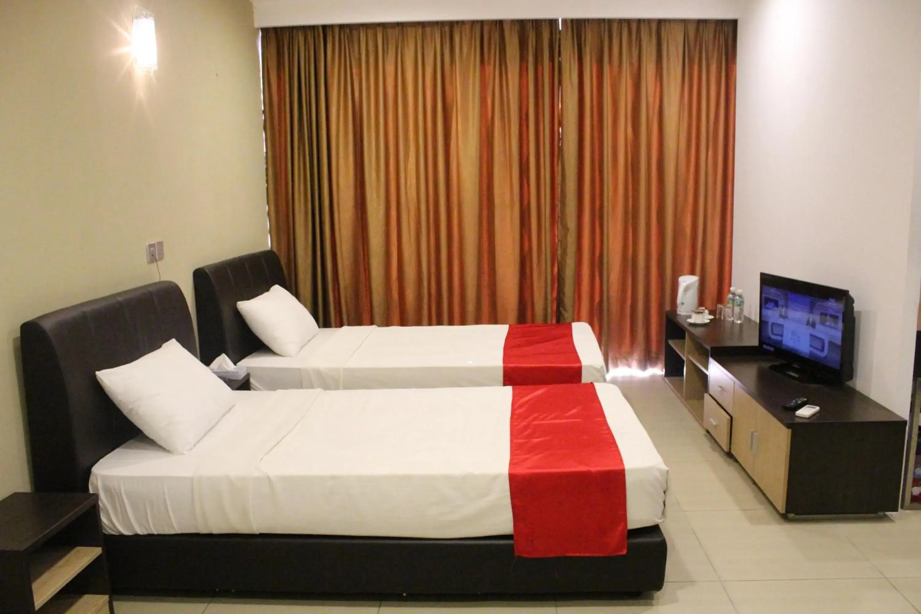 Bed in Sun Inns Hotel Jalan Tar