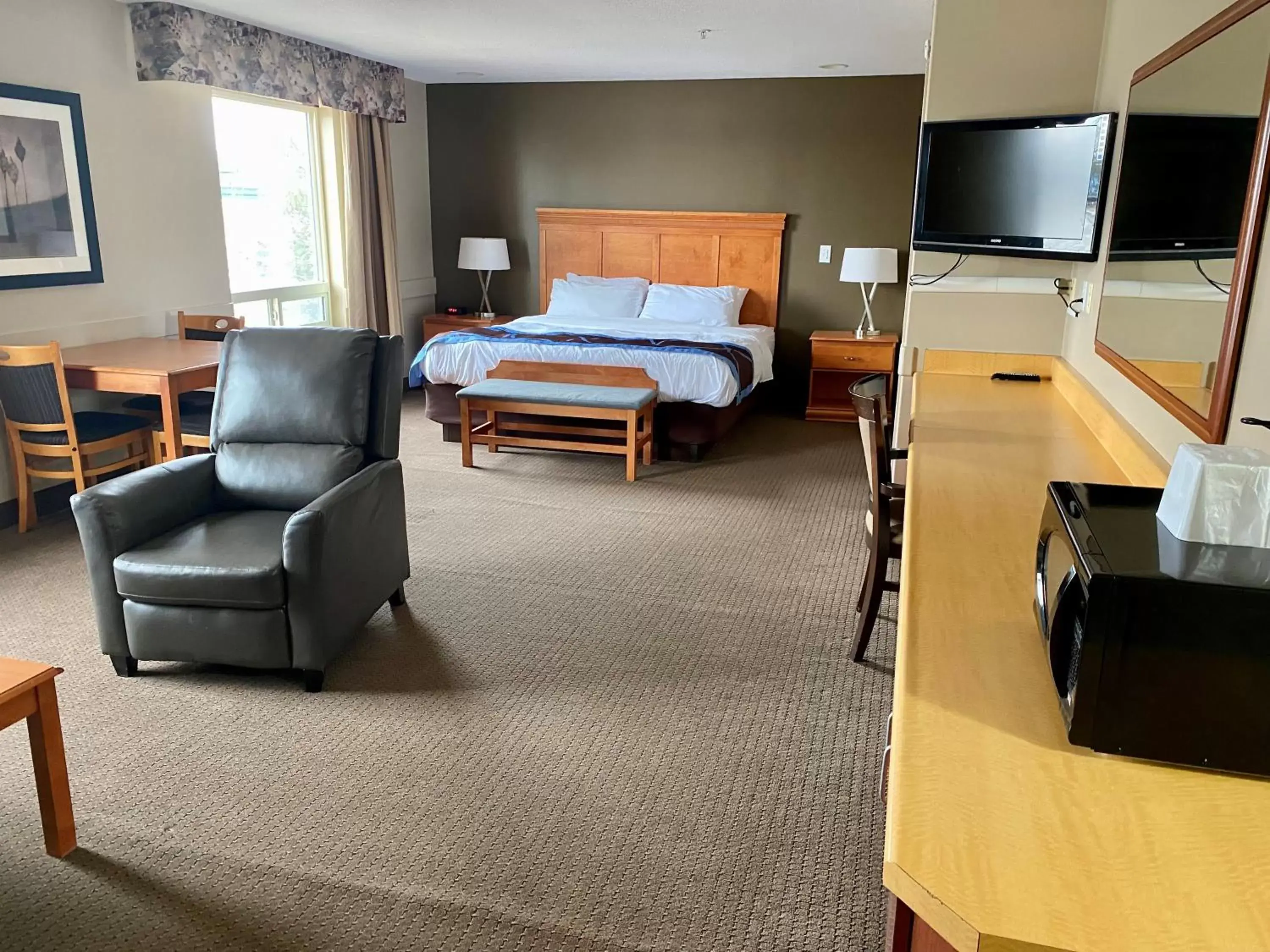 Bed, TV/Entertainment Center in Super 8 by Wyndham Edmonton South