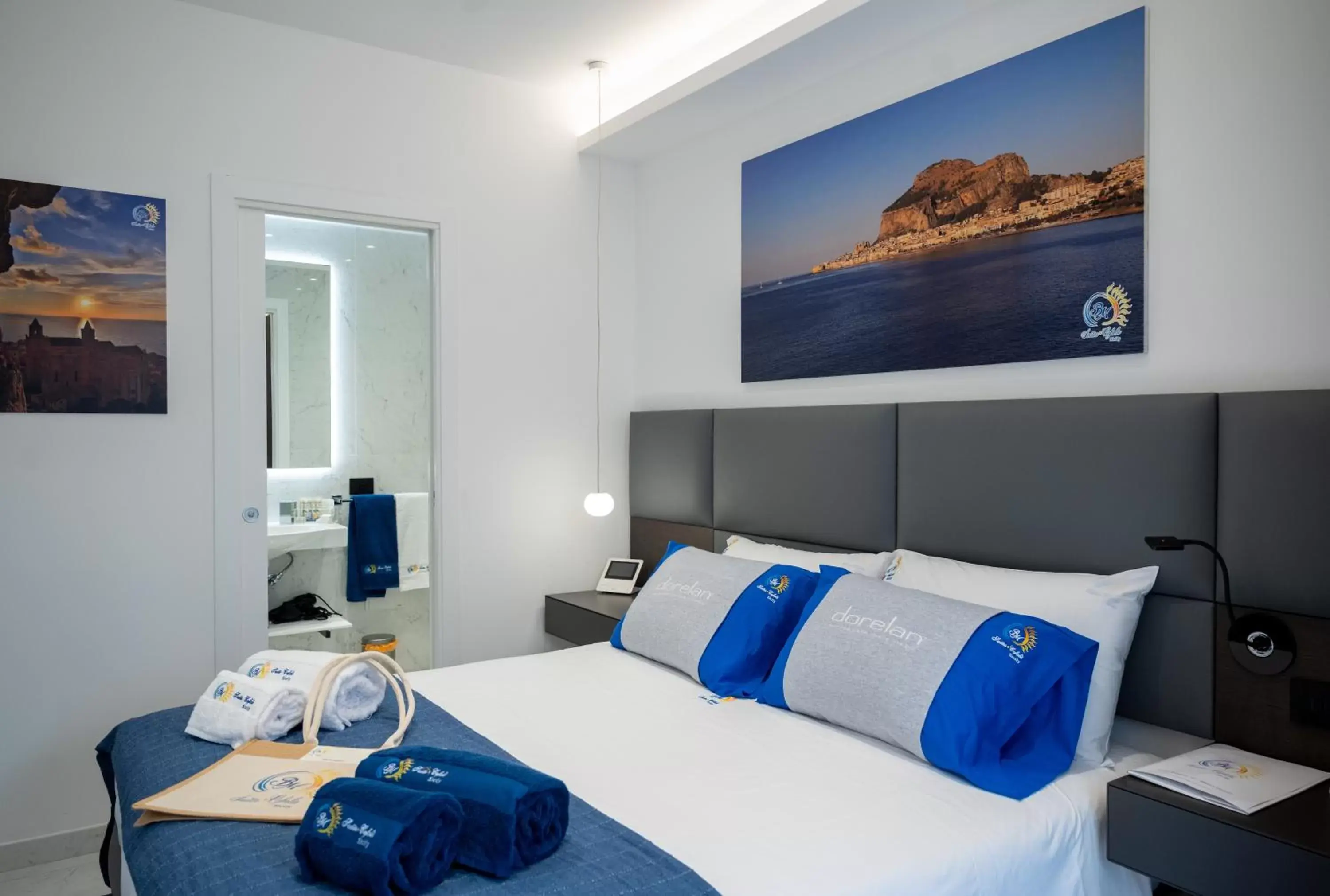 Photo of the whole room, Bed in BM SUITES CEFALU