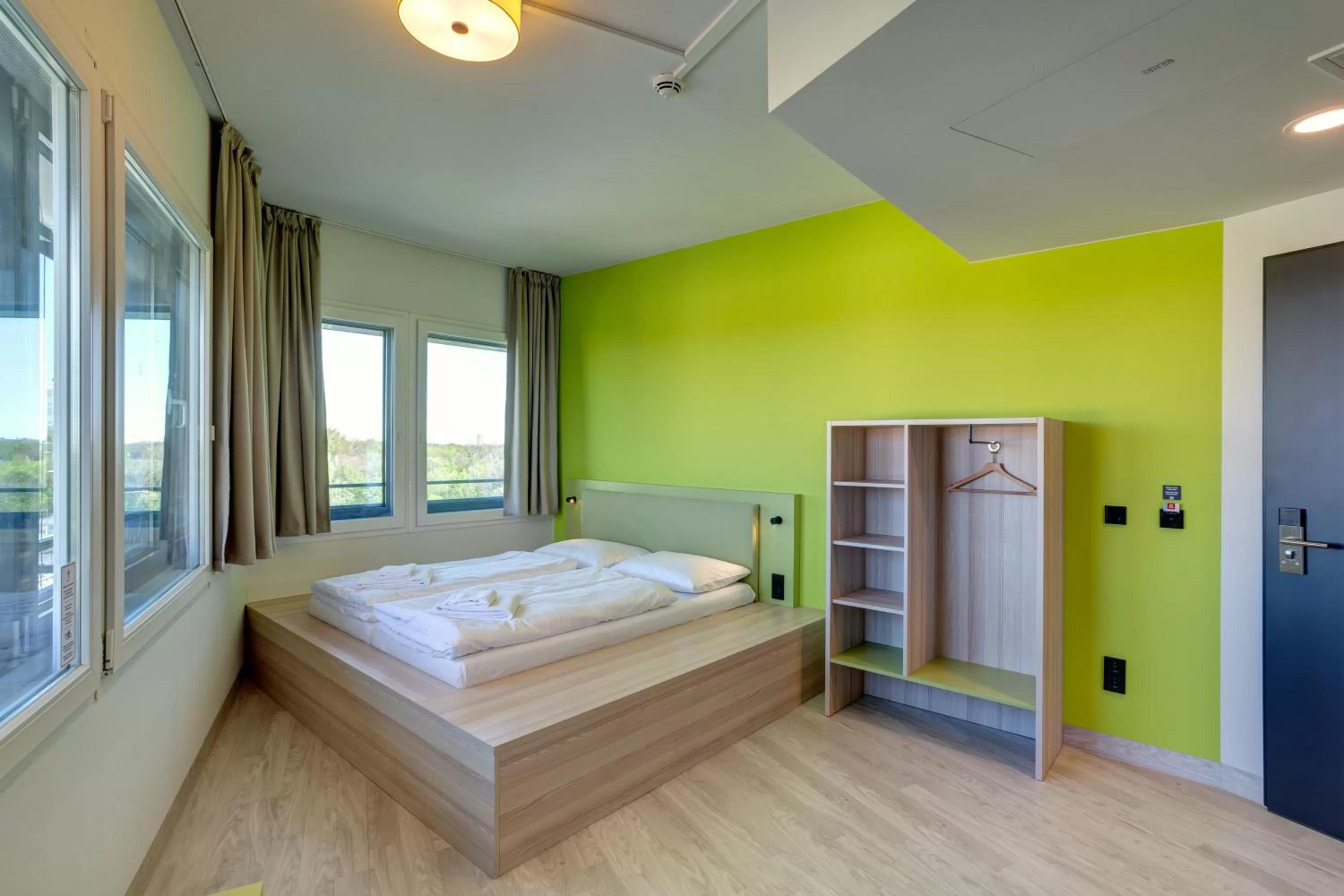 Photo of the whole room, Bed in MEININGER Hotel München Olympiapark