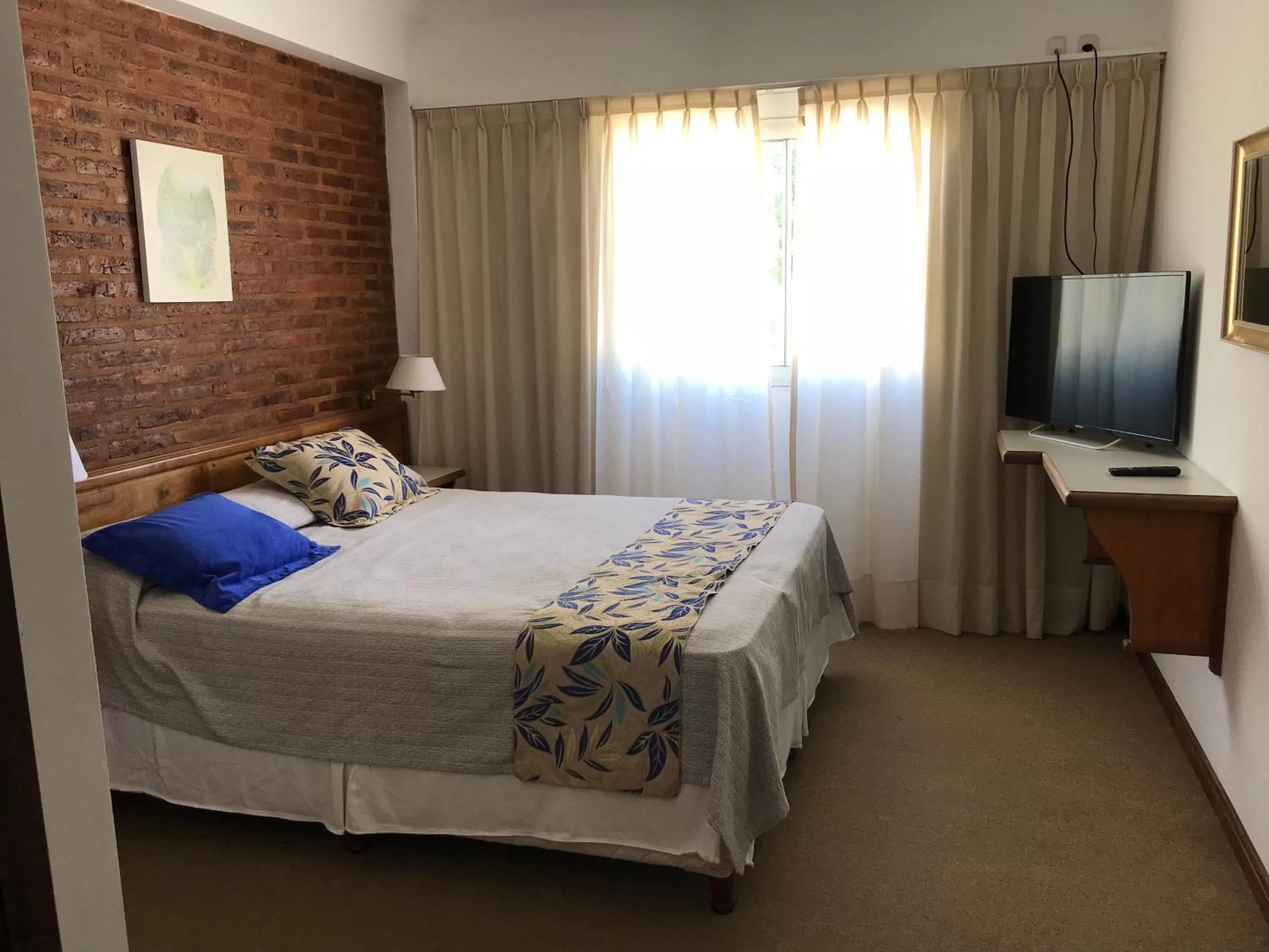 Bed in Costanera Mar Hotel & Suites