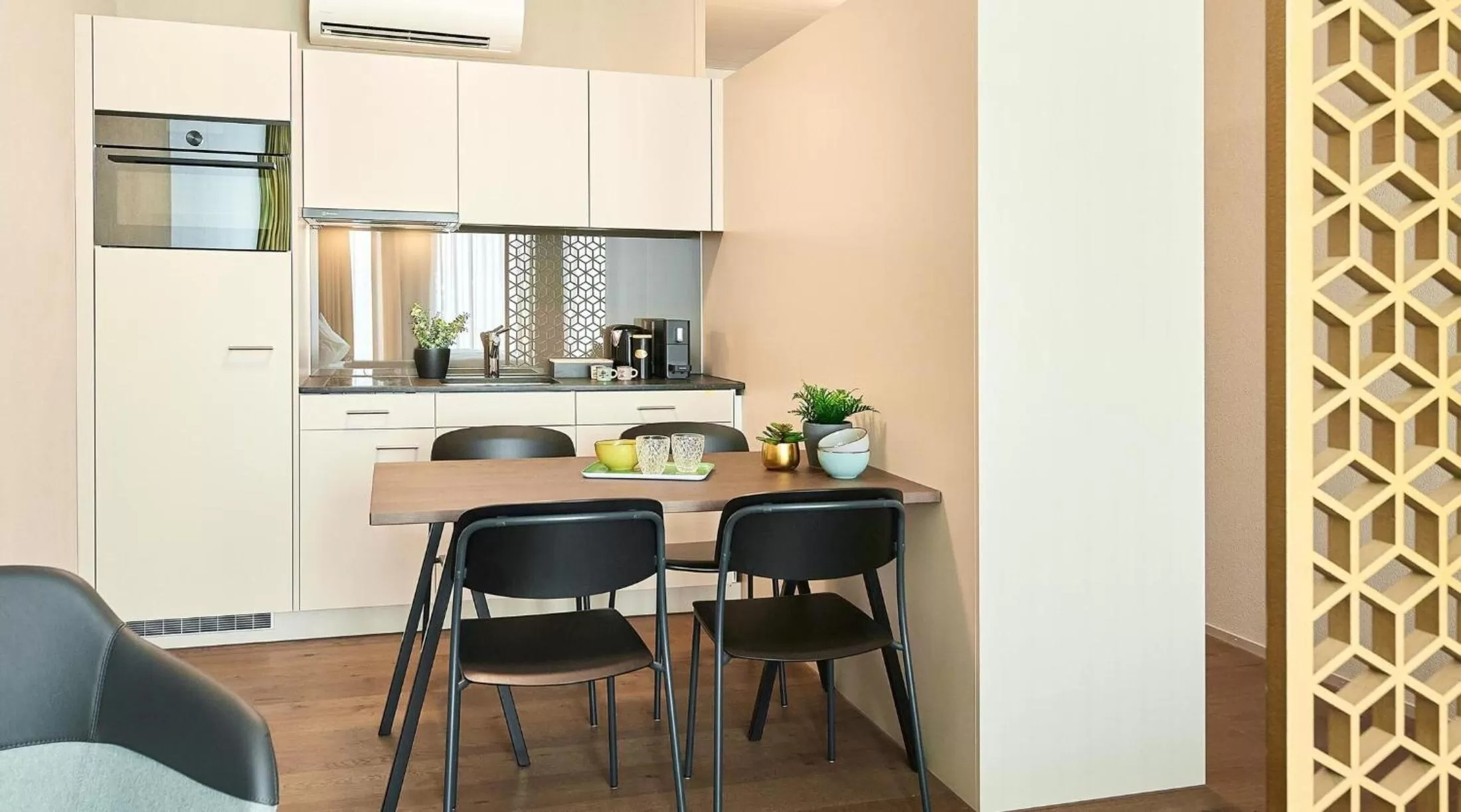Kitchen or kitchenette in Lumen Apartments