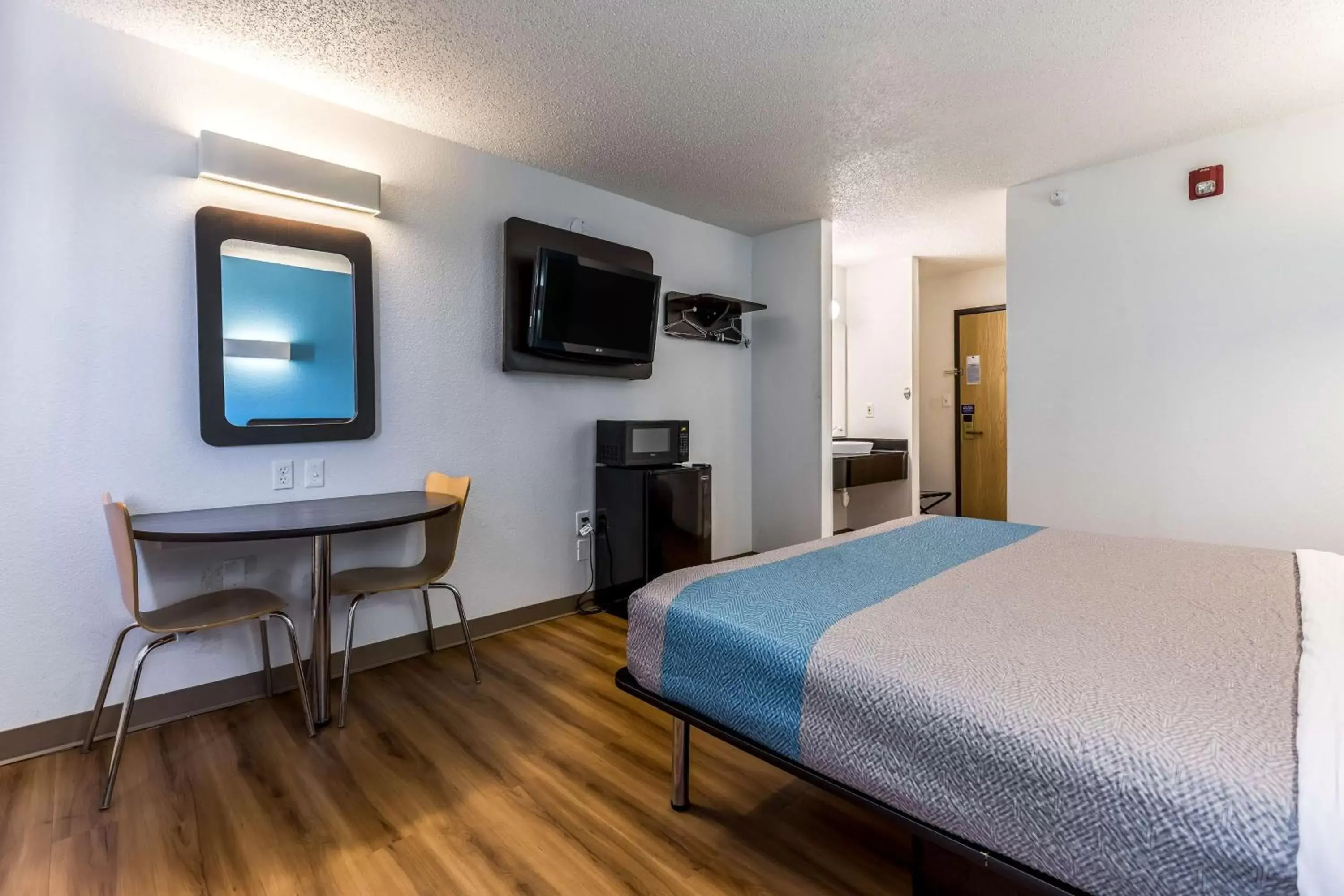 Bedroom, TV/Entertainment Center in Motel 6-Indianapolis, IN - Southport