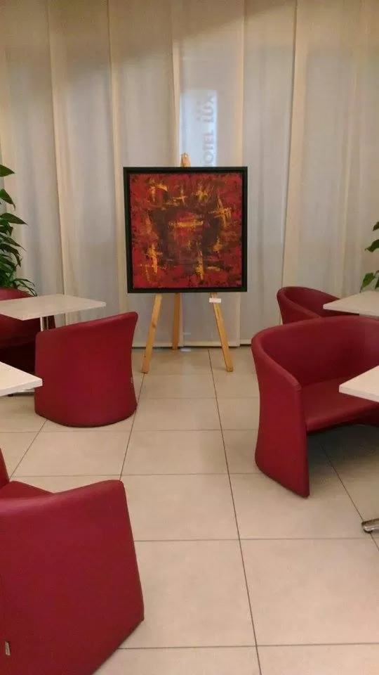 Communal lounge/ TV room in Hotel Lux