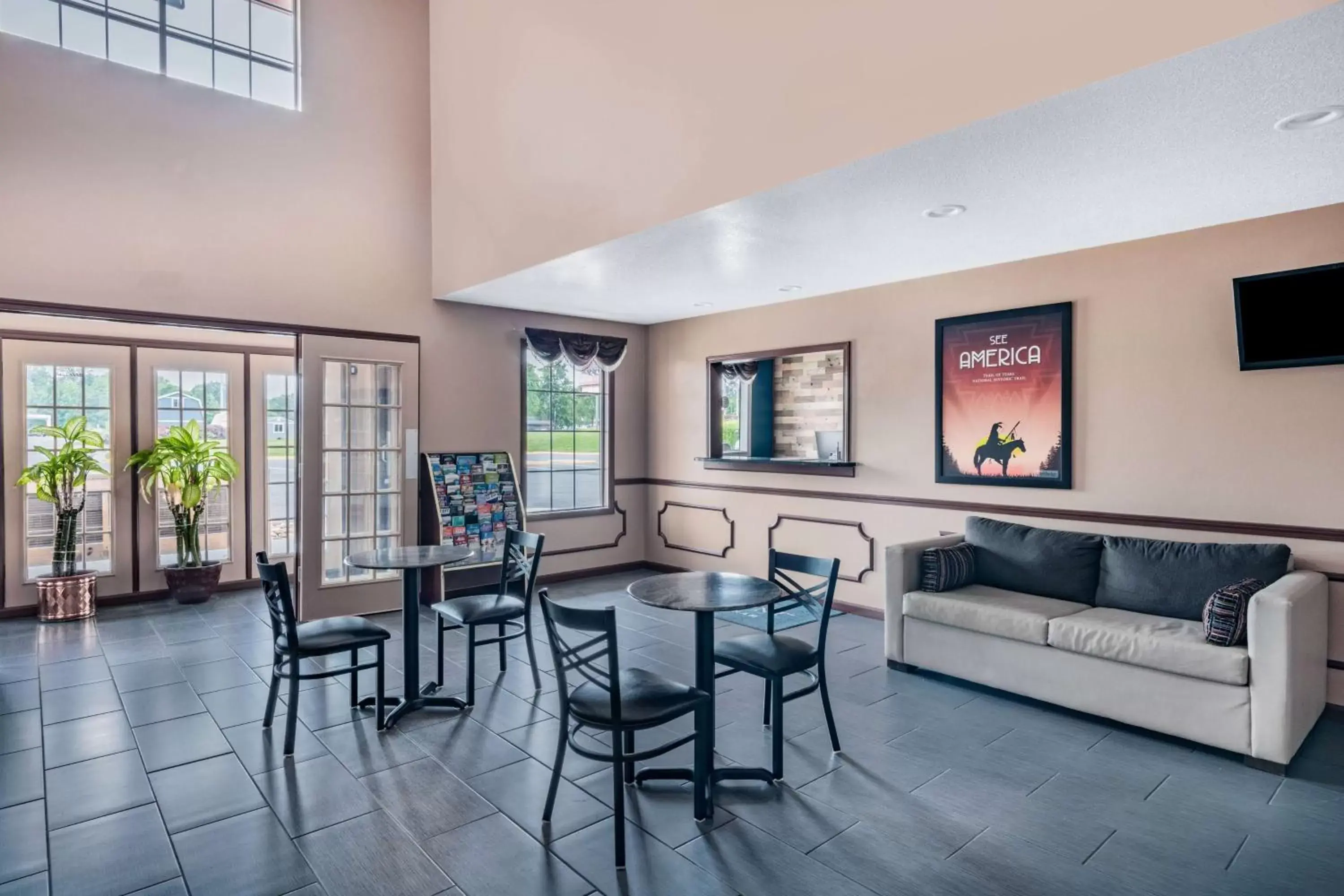 Lobby or reception, Seating Area in Baymont by Wyndham Commerce GA Near Tanger Outlets Mall