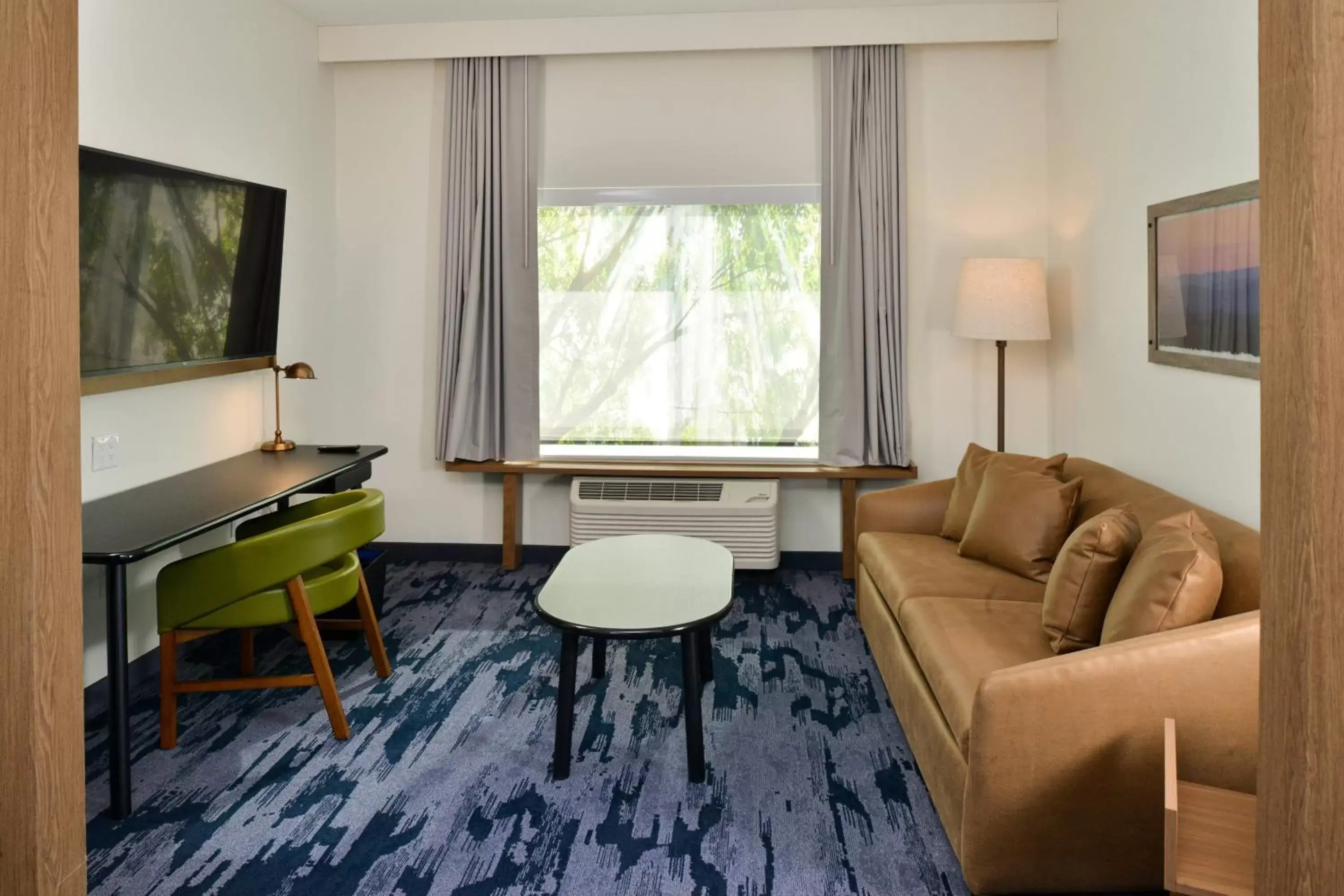 Living room, Seating Area in Fairfield Inn & Suites by Marriott Charlotte University Research Park