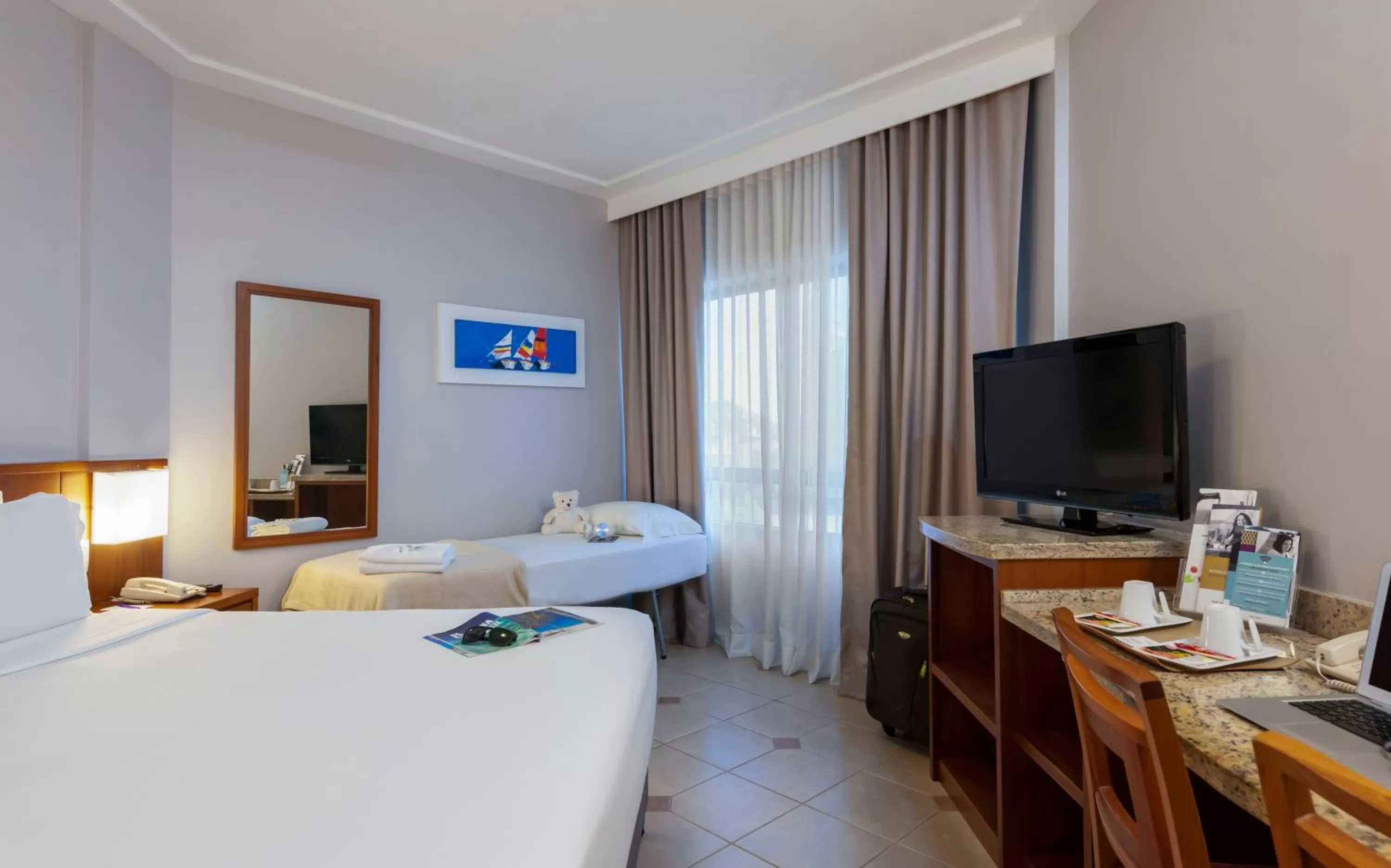 Photo of the whole room, Bed in Mercure Florianópolis