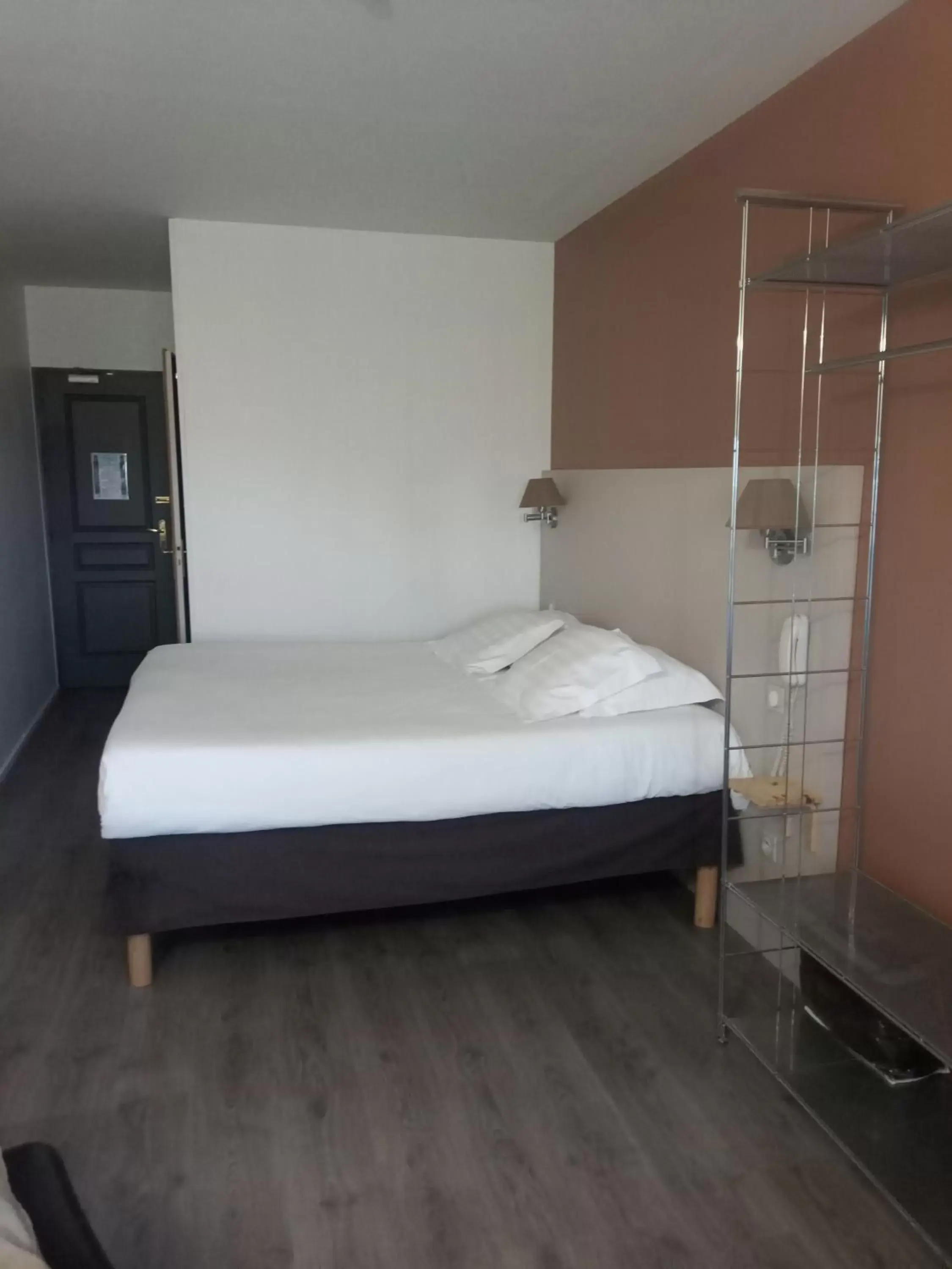 Photo of the whole room, Bed in Logis Hôtel La Bastide des Oliviers Photo of the whole room, Bed in Logis Hôtel La Bastide des Oliviers