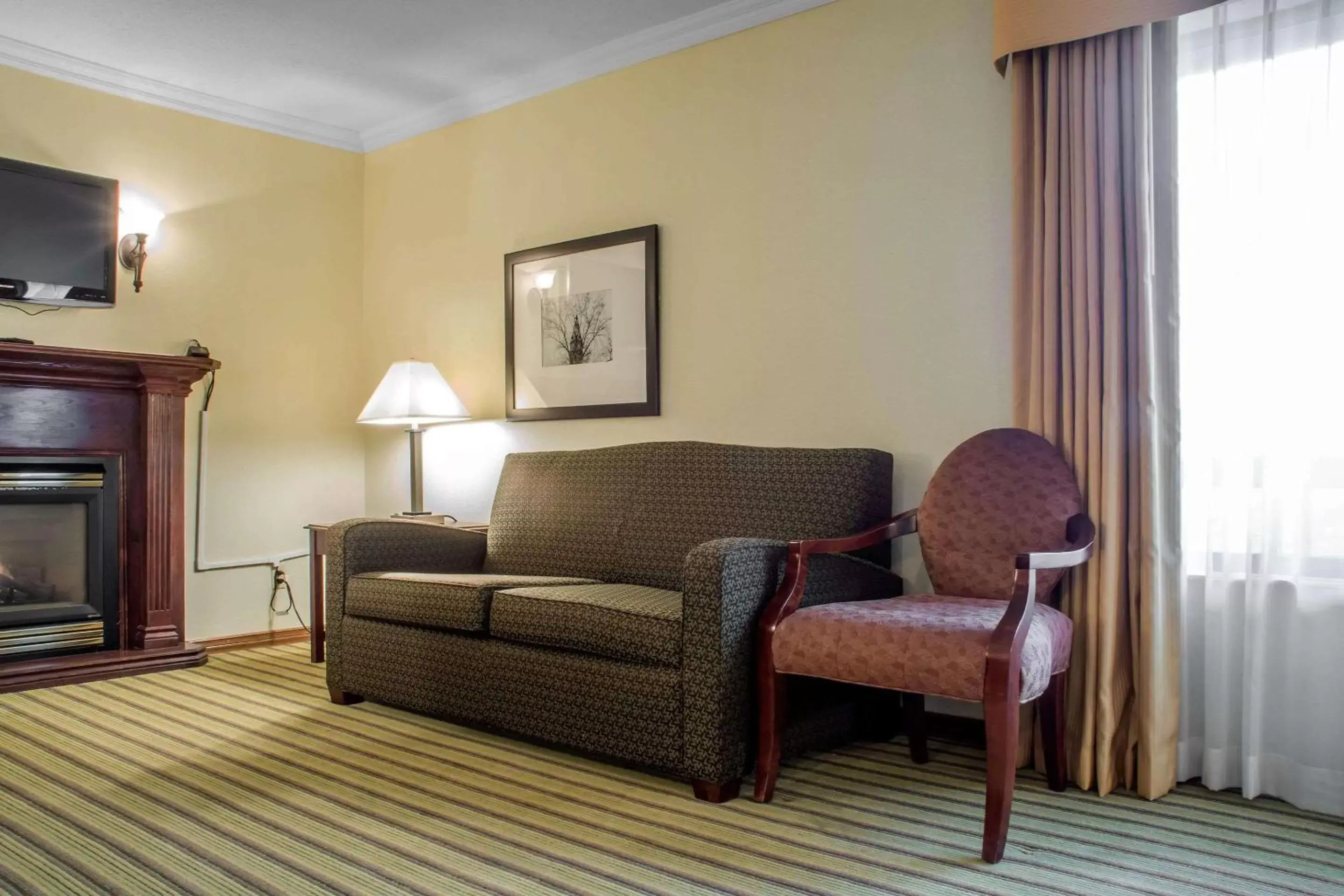 Photo of the whole room, Seating Area in Quality Inn Peterborough