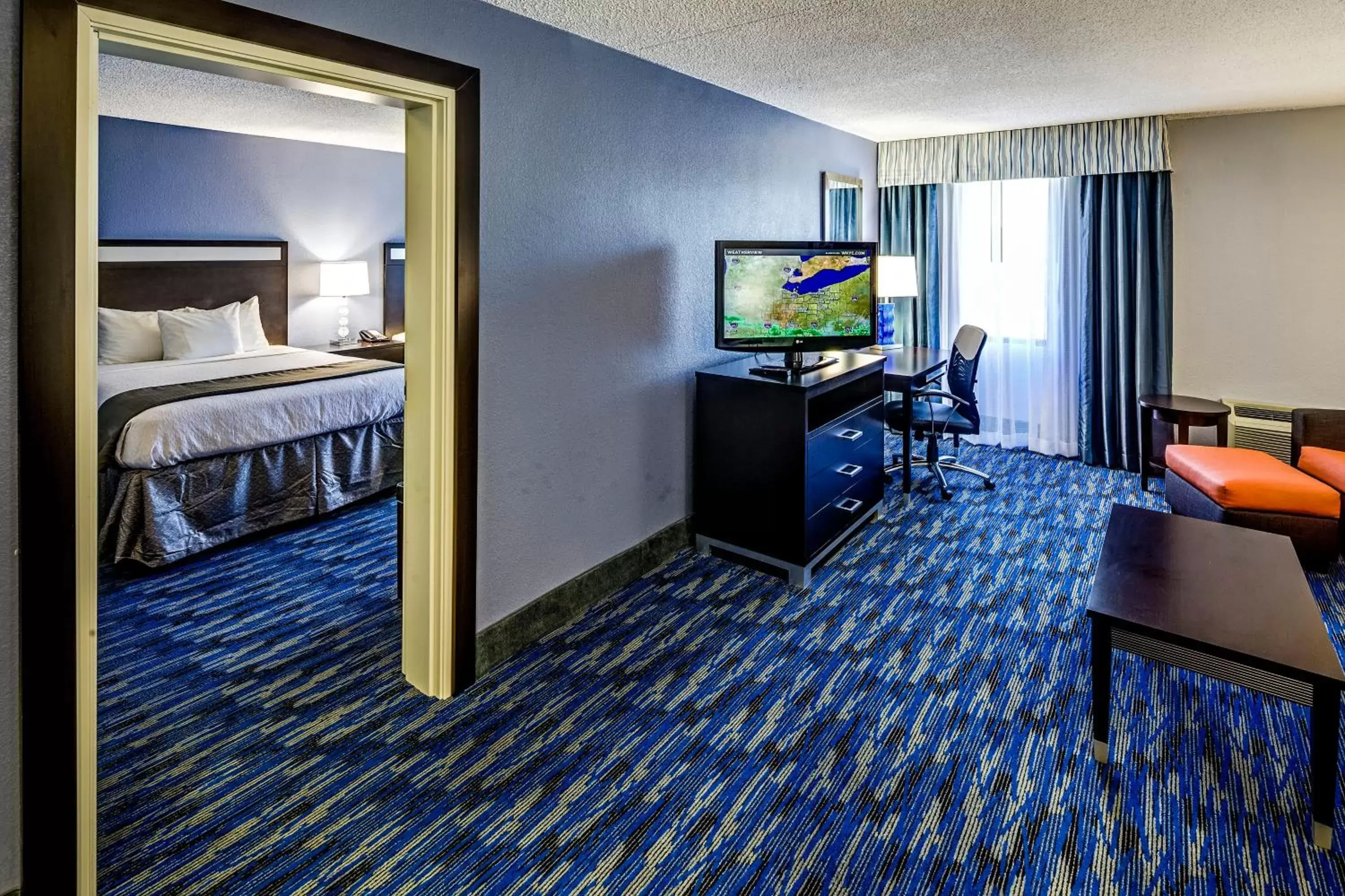 Photo of the whole room, TV/Entertainment Center in Holiday Inn Cleveland Northeast - Mentor, an IHG Hotel