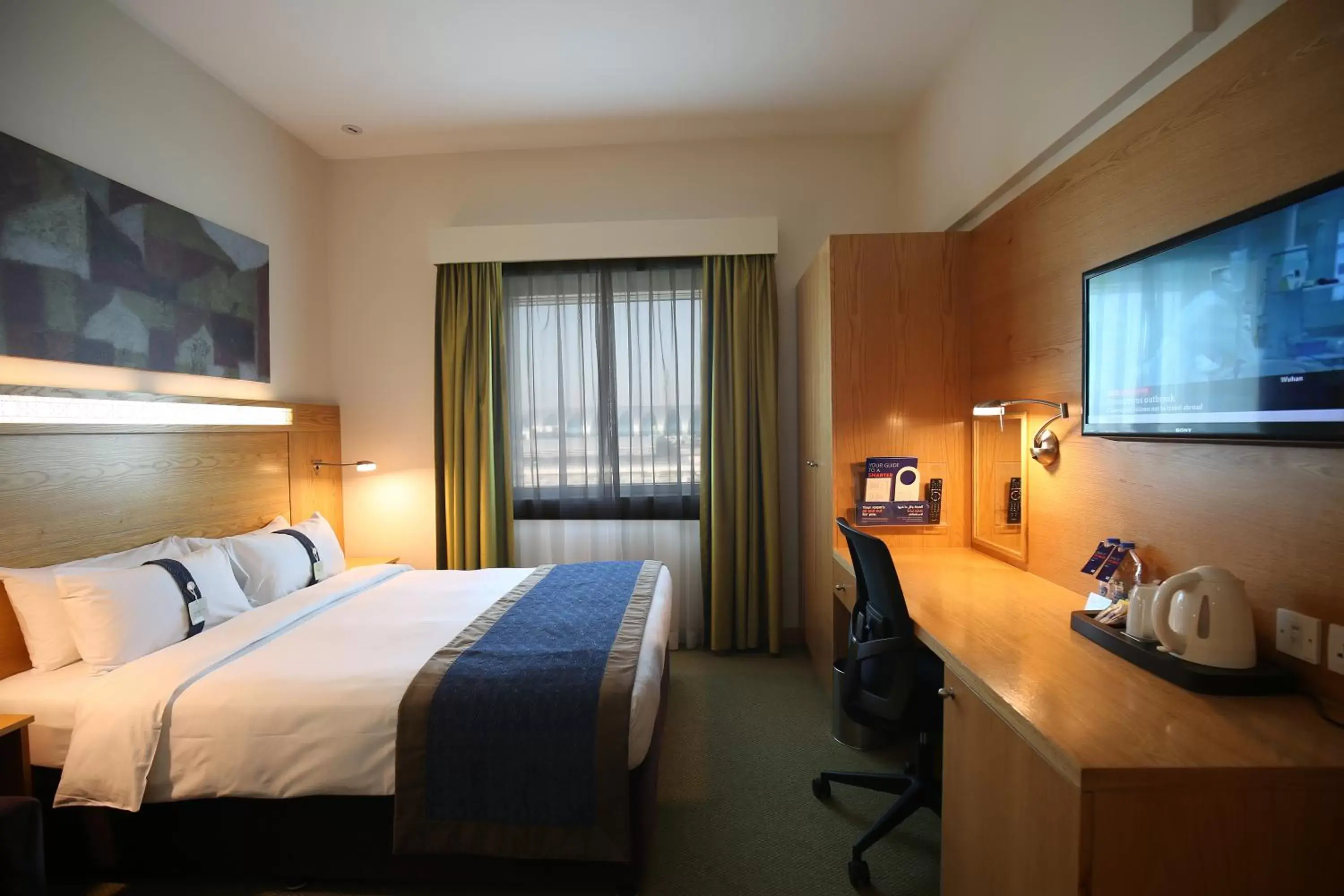 Photo of the whole room in Holiday Inn Express Dubai Airport, an IHG Hotel