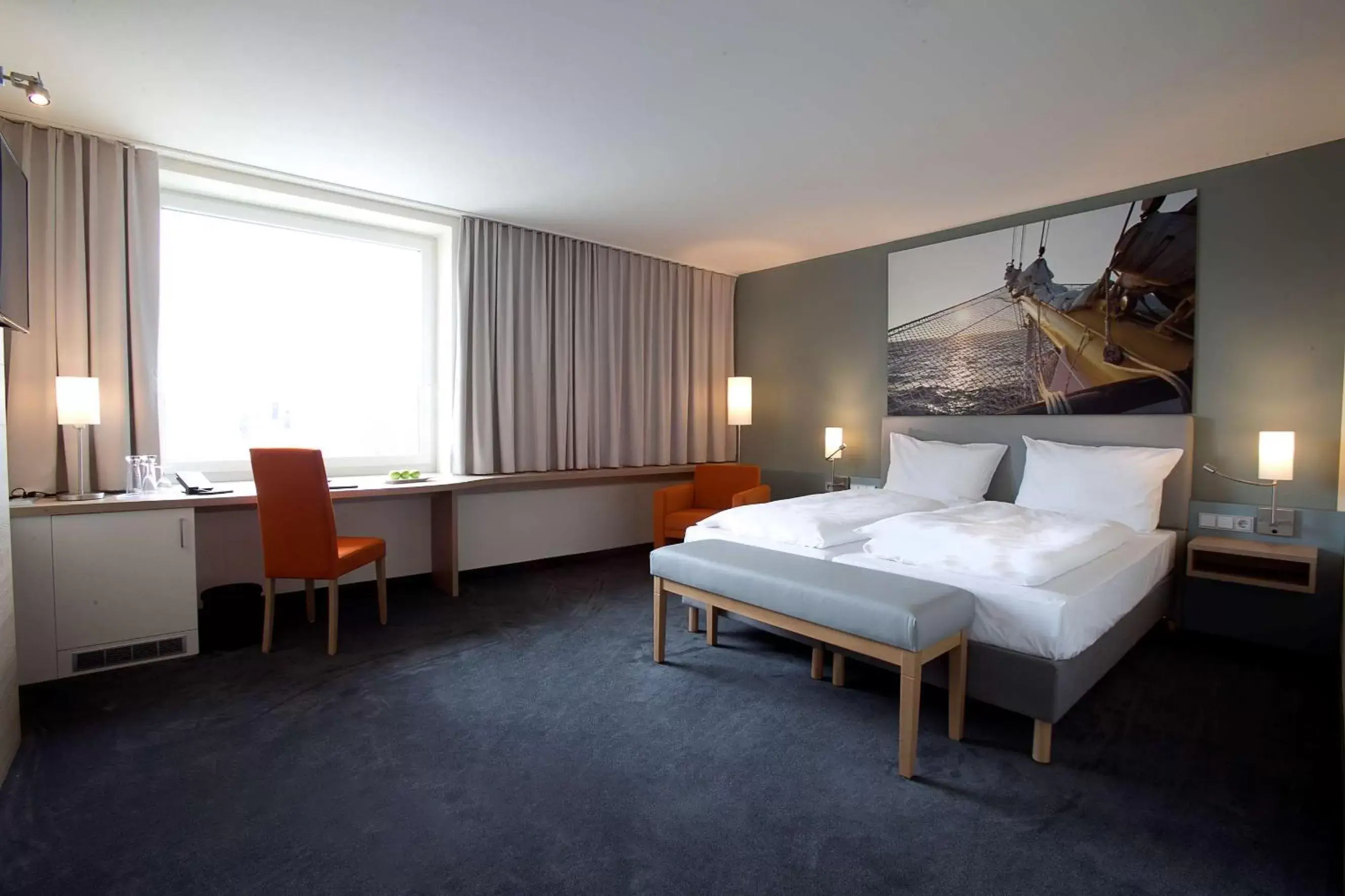 Photo of the whole room, Bed in Nordsee Hotel City