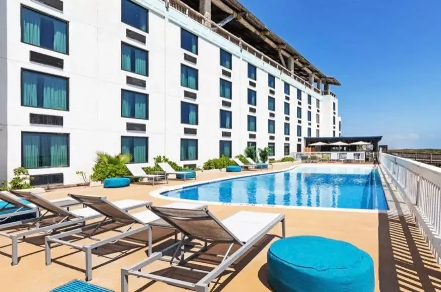 Swimming Pool in Holiday Inn Resort South Padre Island-Beach Front, an IHG Hotel