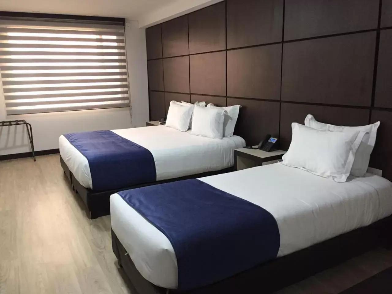 Bed in Hotel American Visa Tower