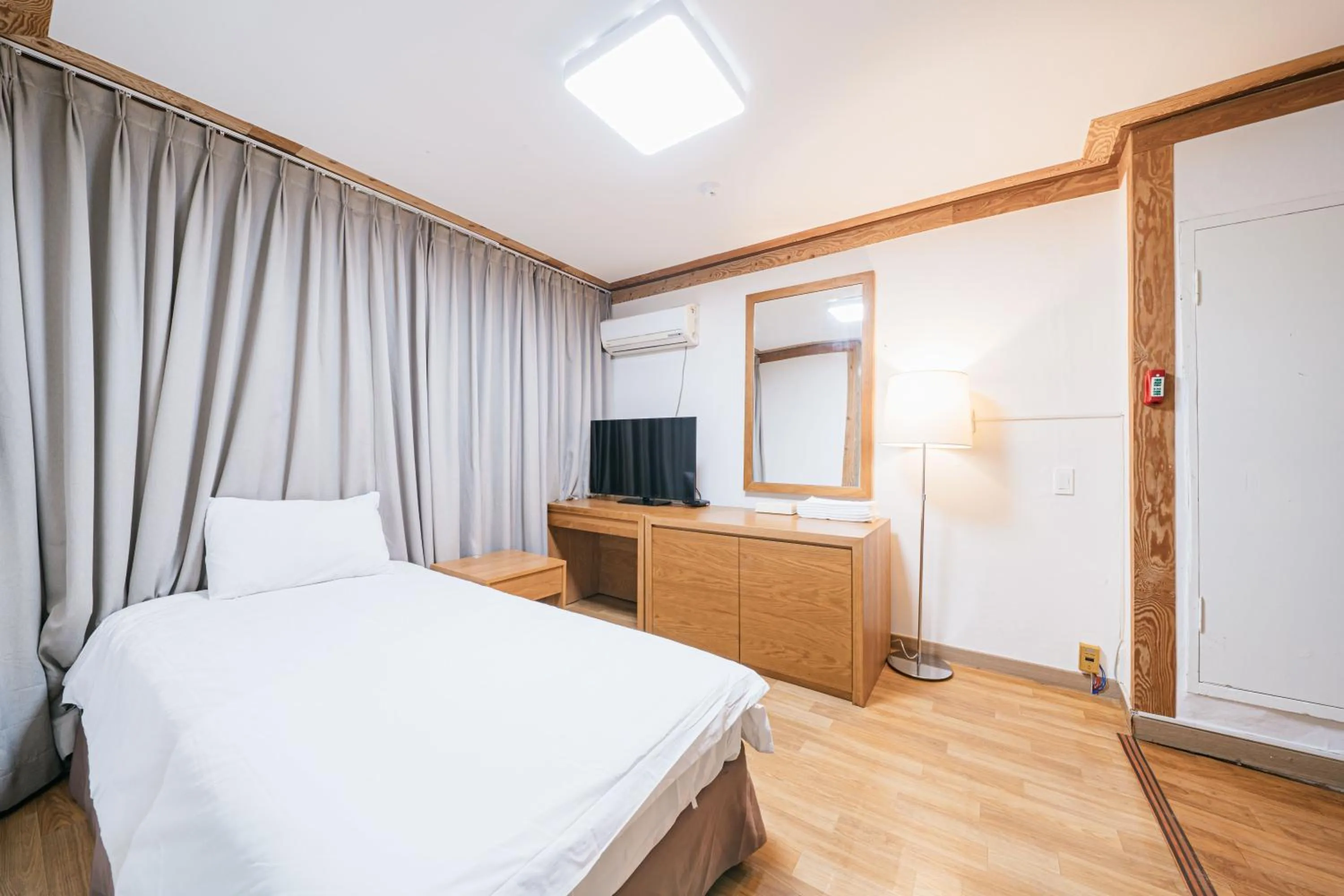 Bed in Jeju Miracle Hotel